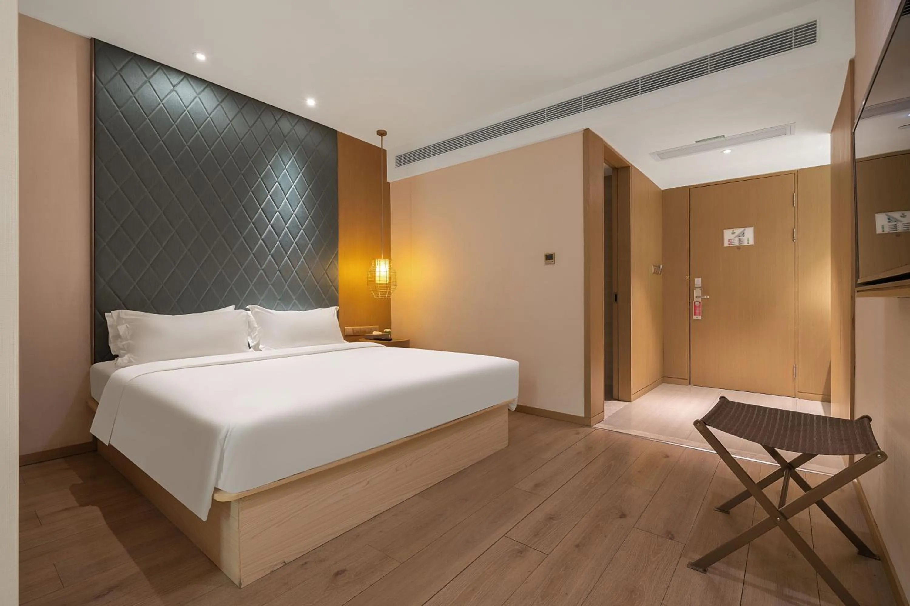 Bed in Ibis Styles XM Zhongshan Hotel