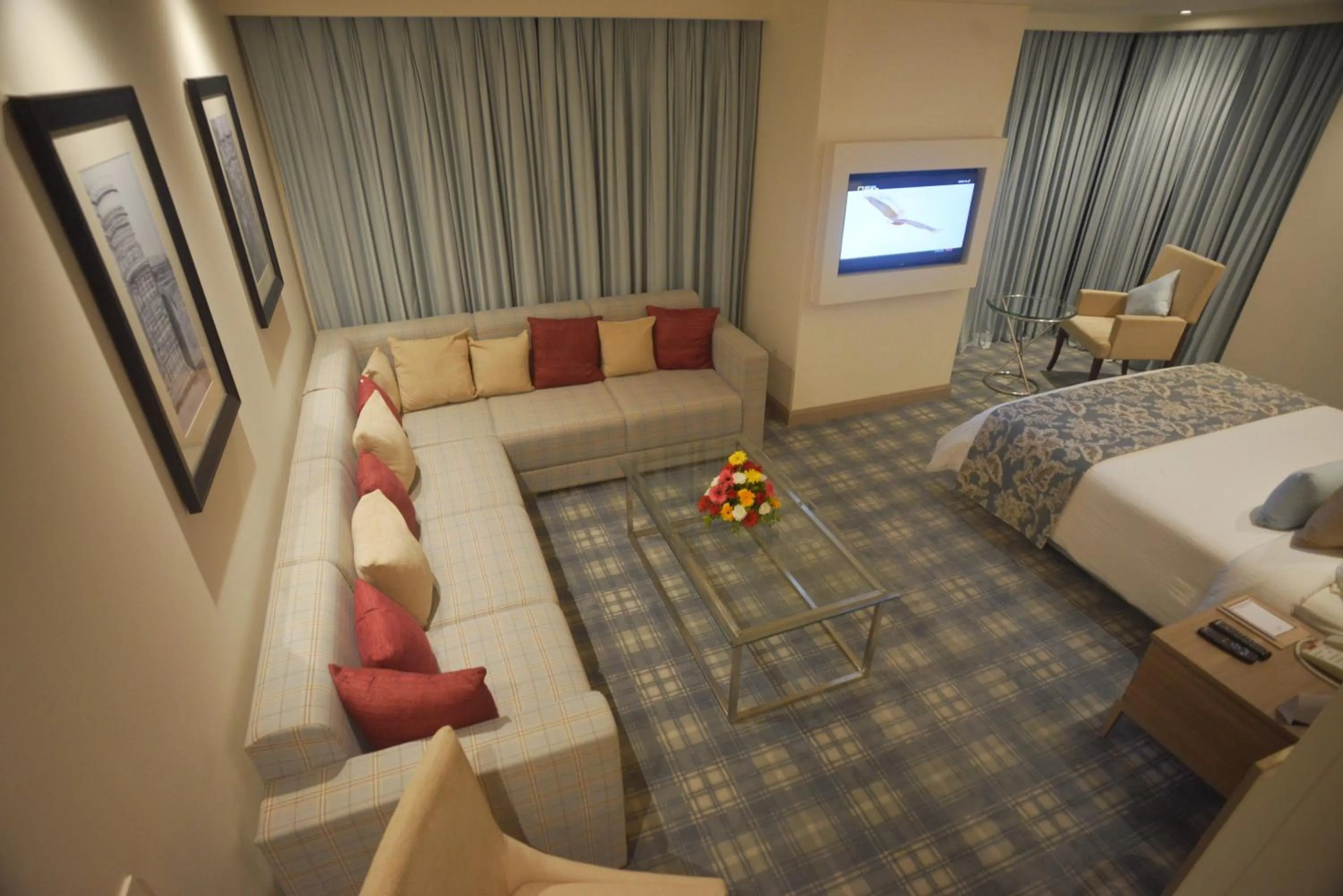 Bedroom, Bed in Efcee Sarovar Premiere Bhavnagar