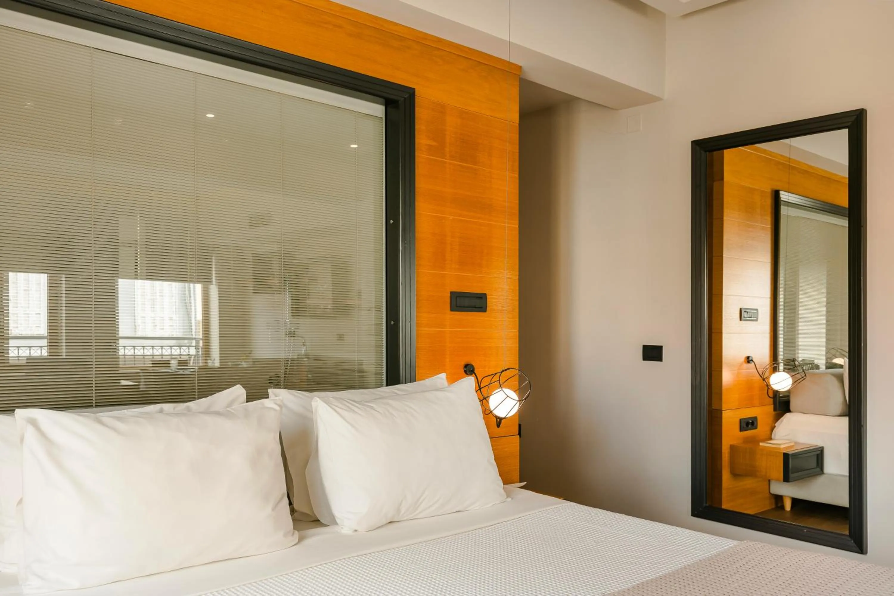 Bed in Querini Luxury Suites