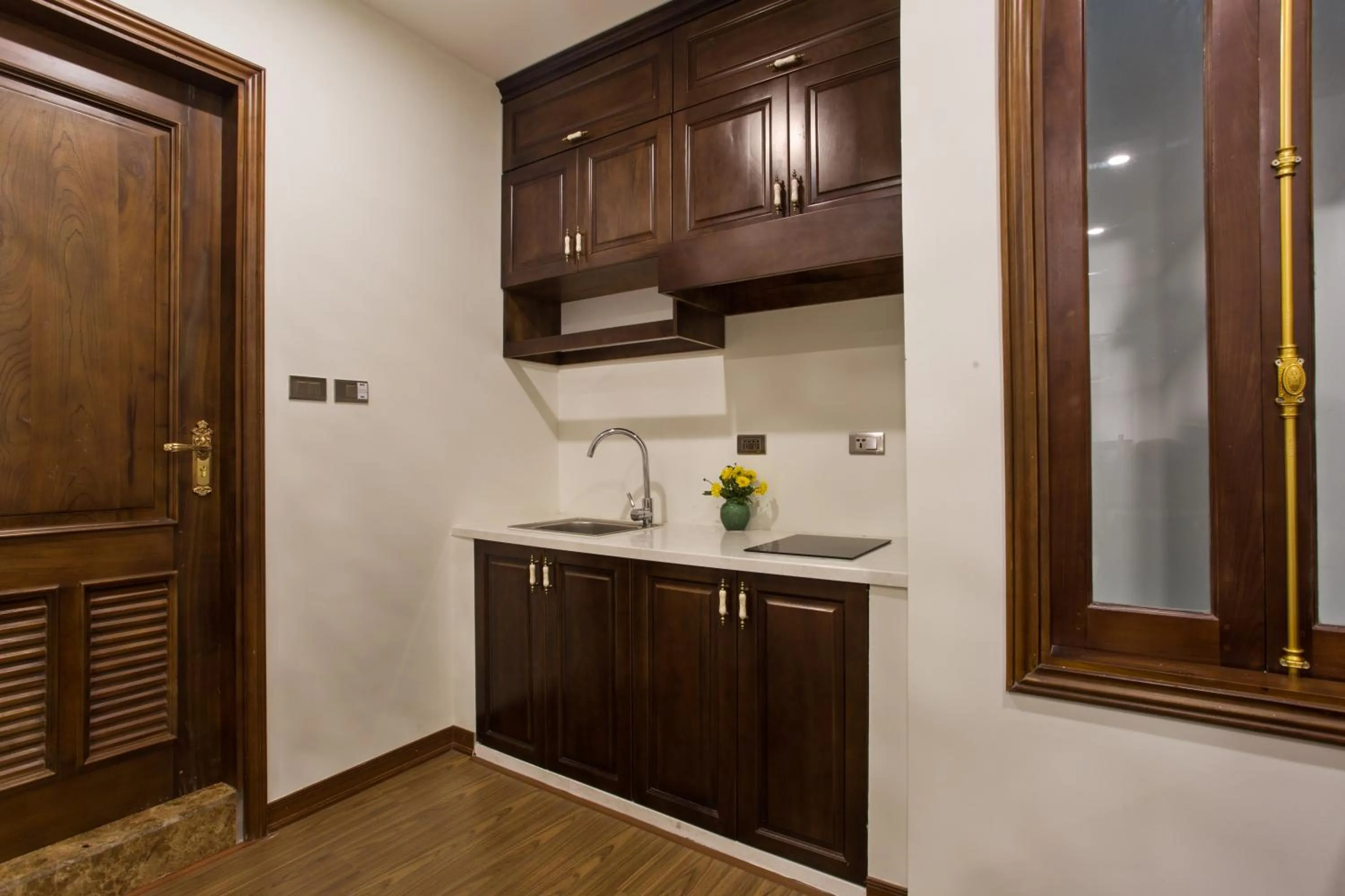 Kitchen or kitchenette in Maro Hotel