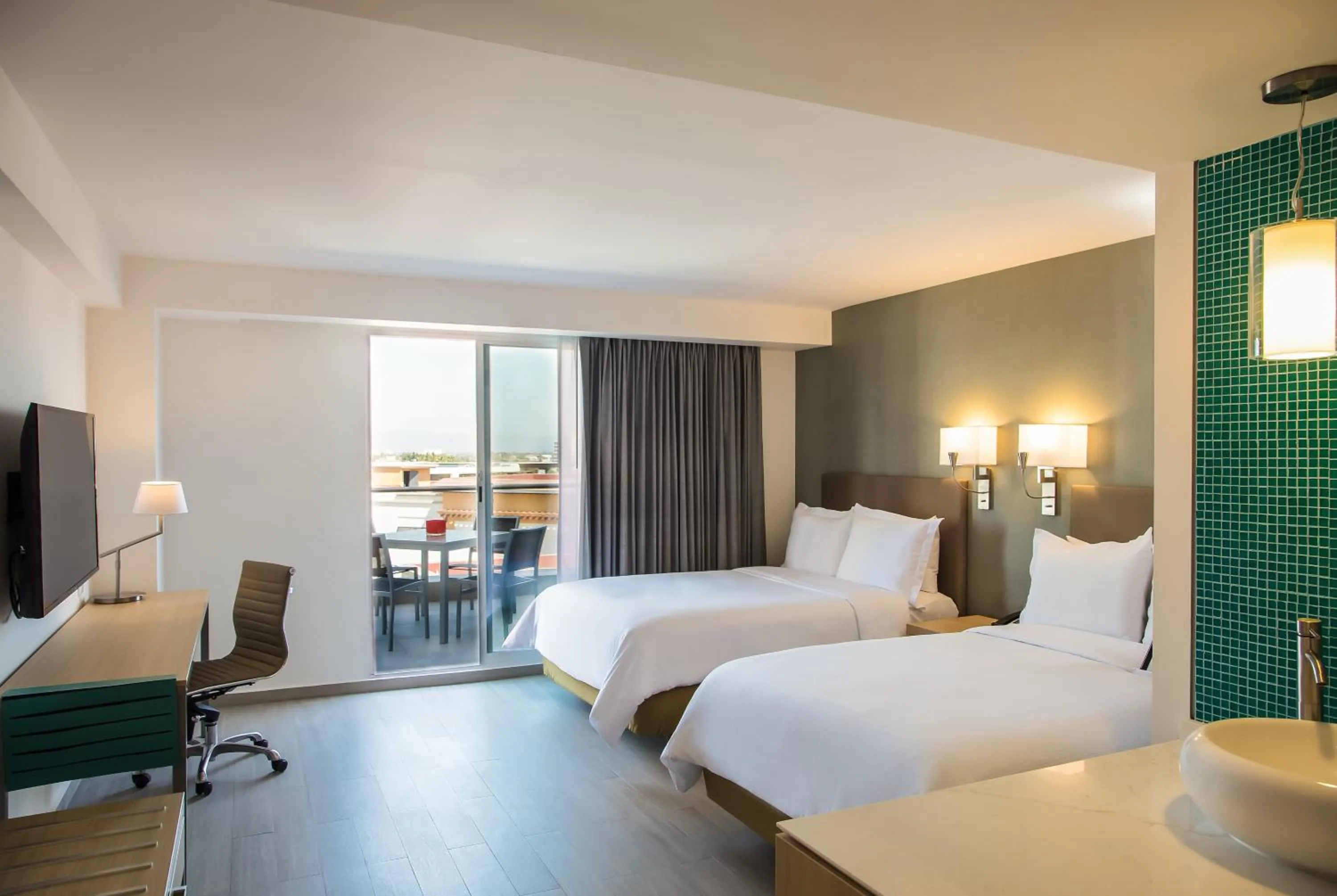 Photo of the whole room, Bed in Fiesta Inn Puerto Vallarta Isla