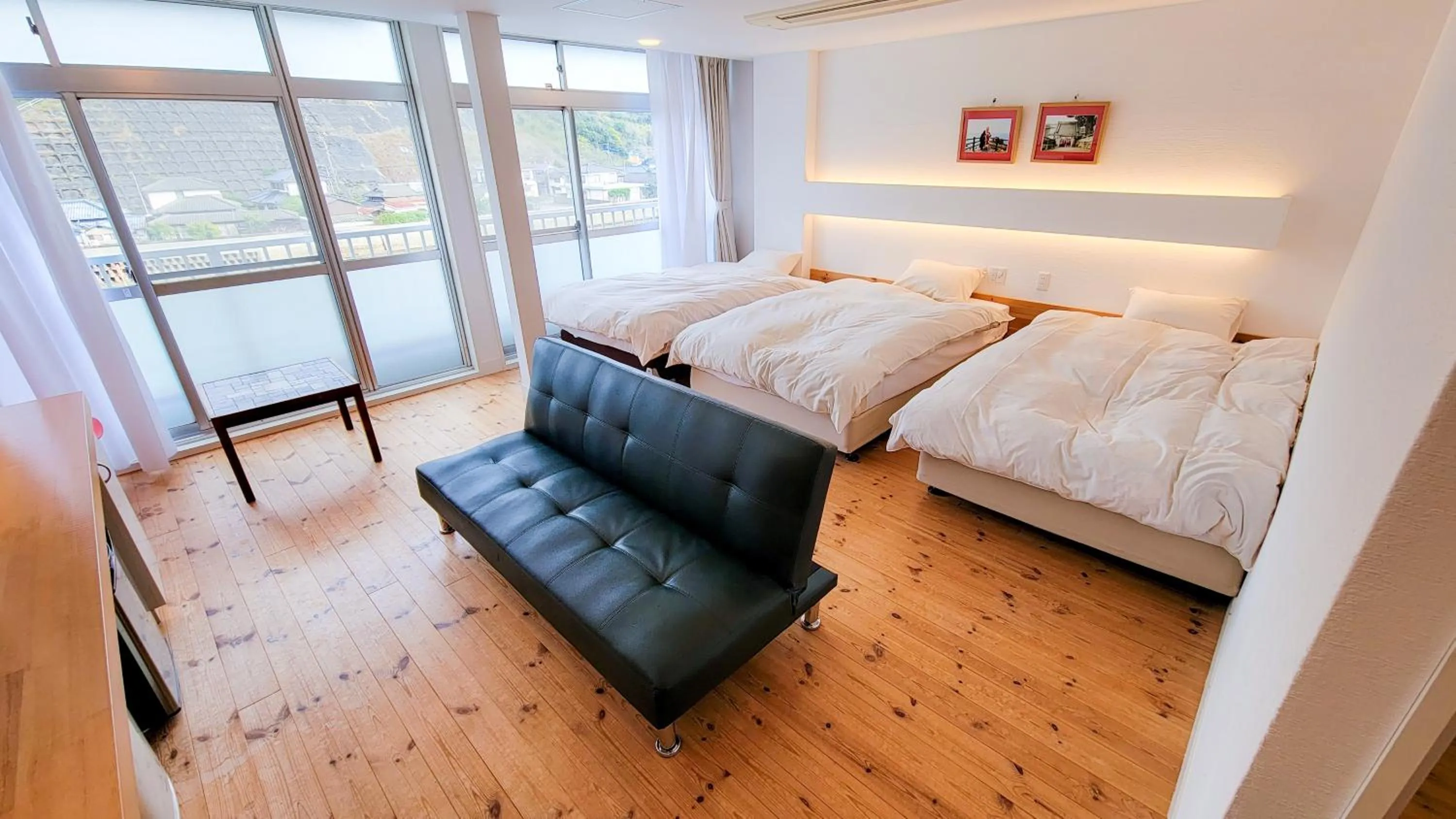 Bed in Amakusa Santacoming Hotel