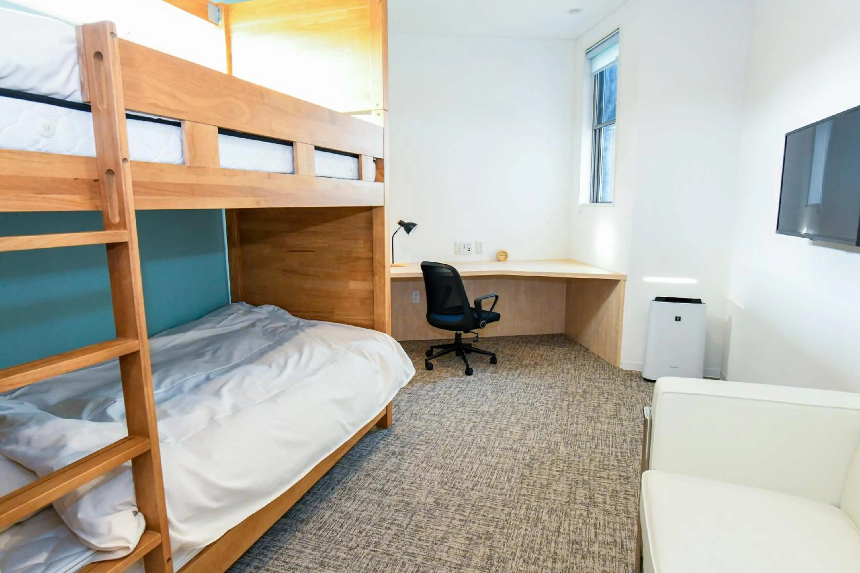 Bed in Amakusa Santacoming Hotel