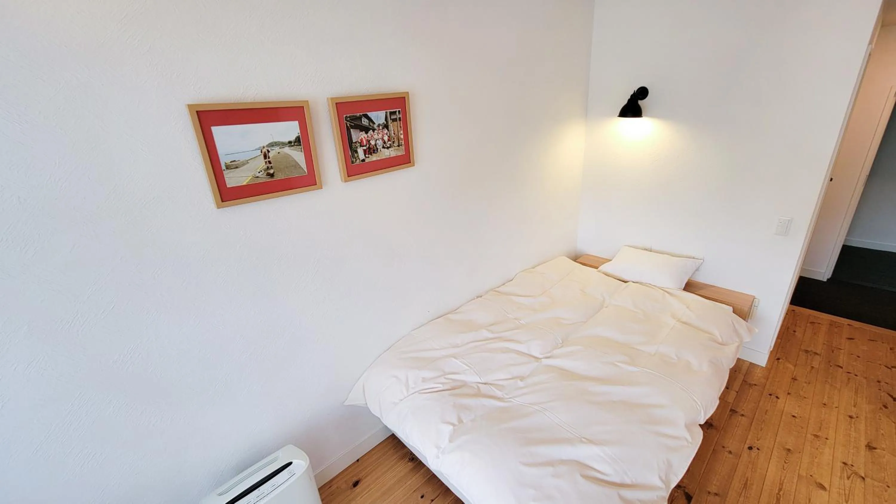 Bed in Amakusa Santacoming Hotel