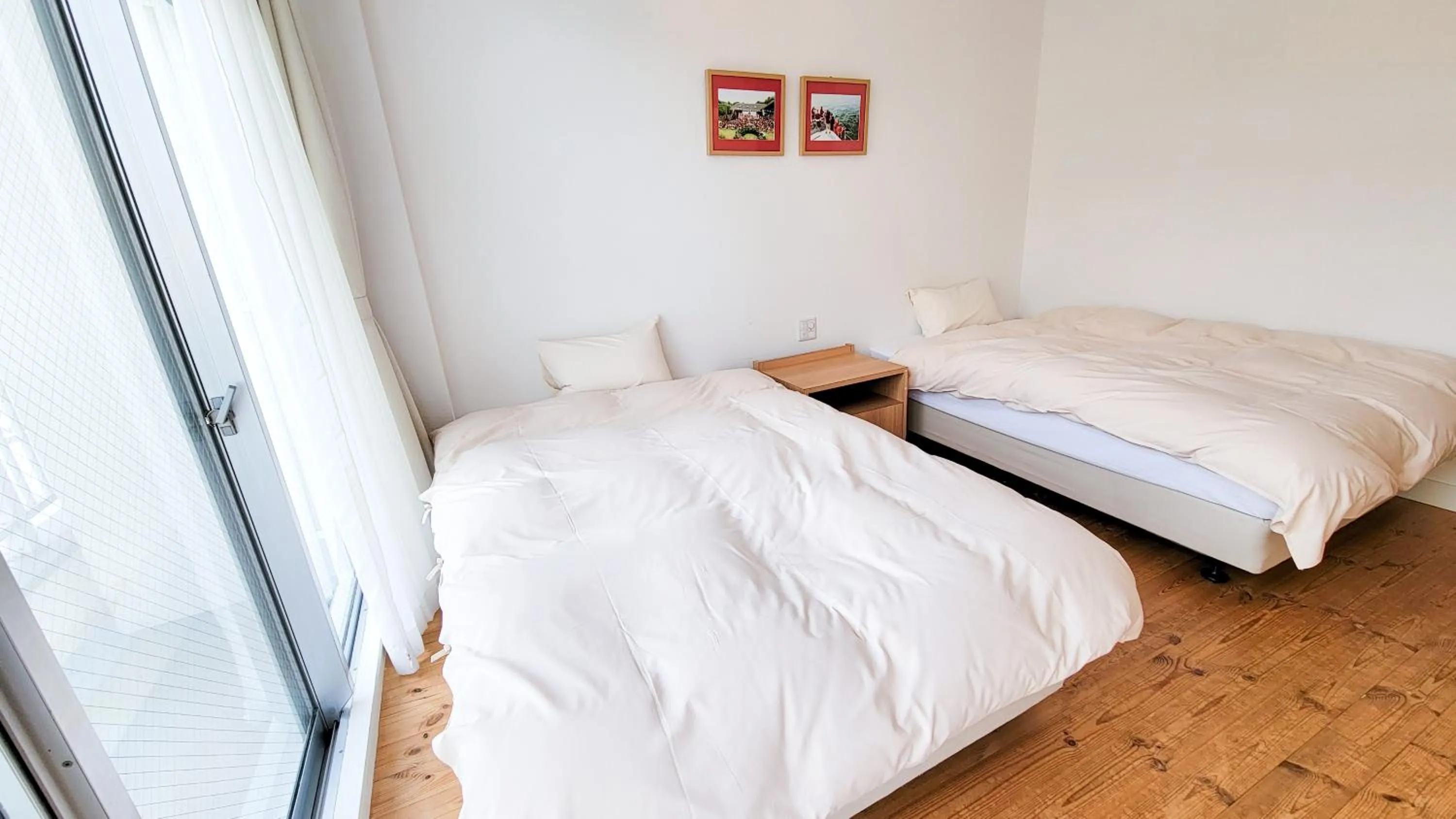 Bed in Amakusa Santacoming Hotel