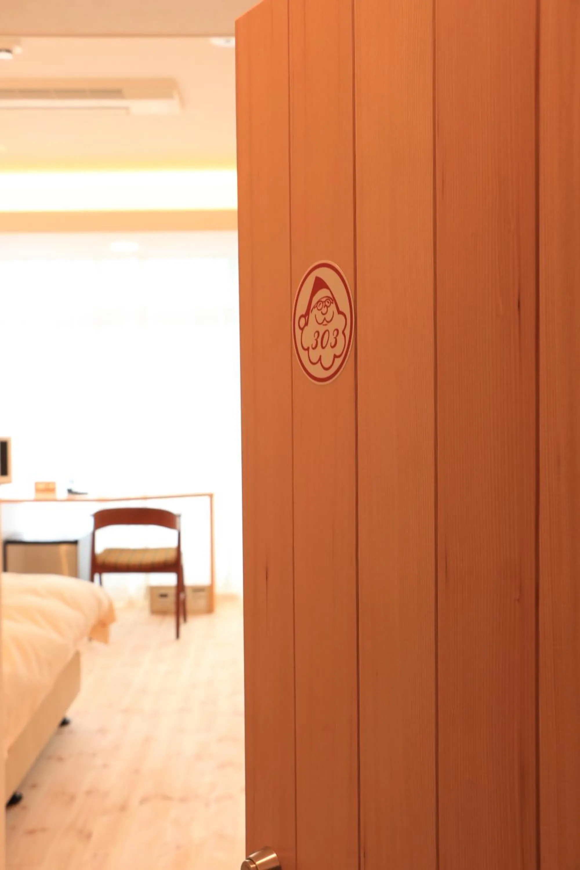 Bed in Amakusa Santacoming Hotel