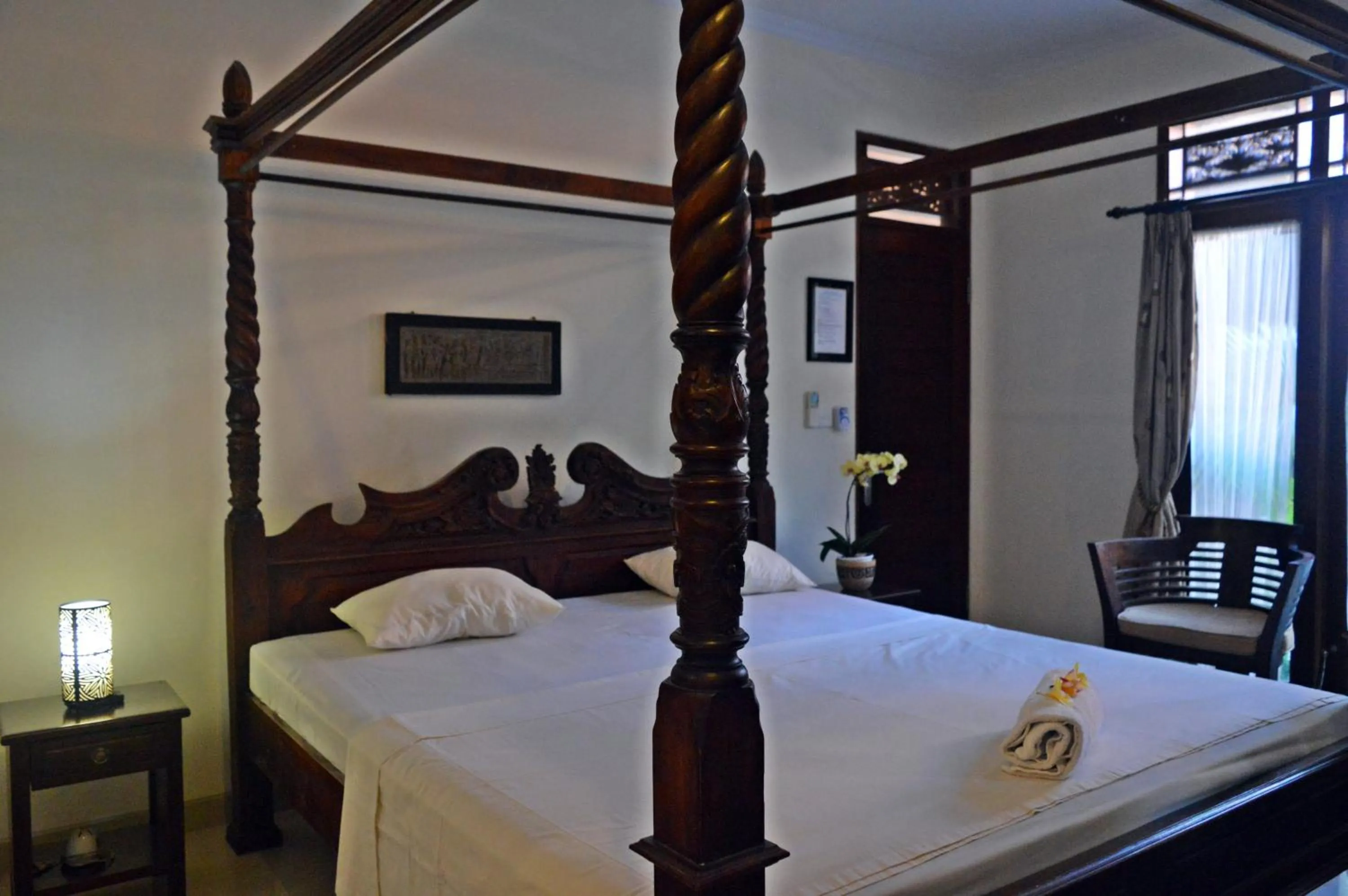 Bed in Yulia 2 Homestay Sanur