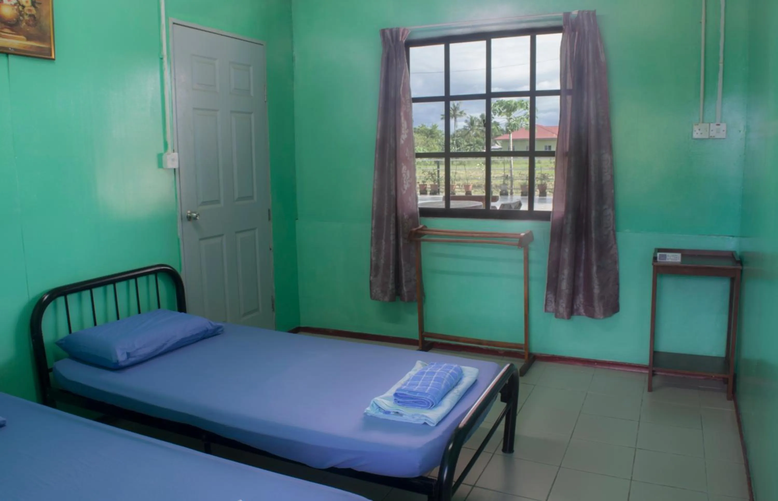Bed in Taun Gusi Village Homestay