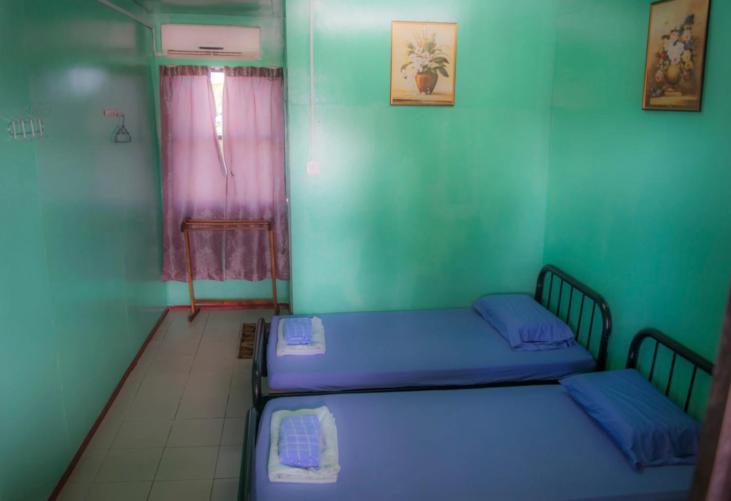 Bed in Taun Gusi Village Homestay