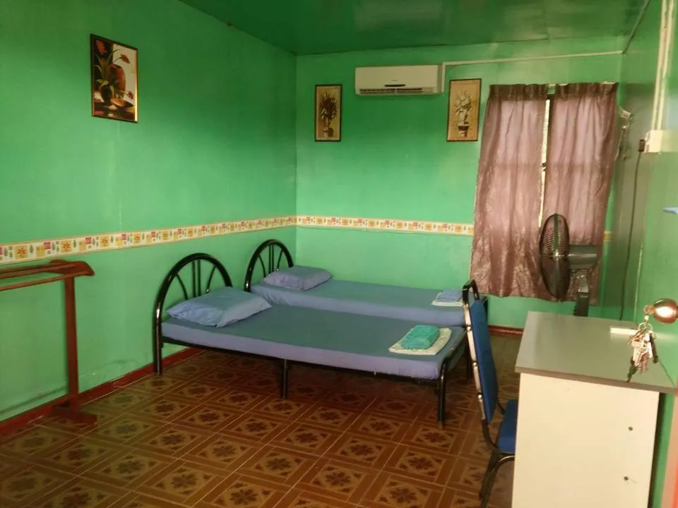 Bed in Taun Gusi Village Homestay