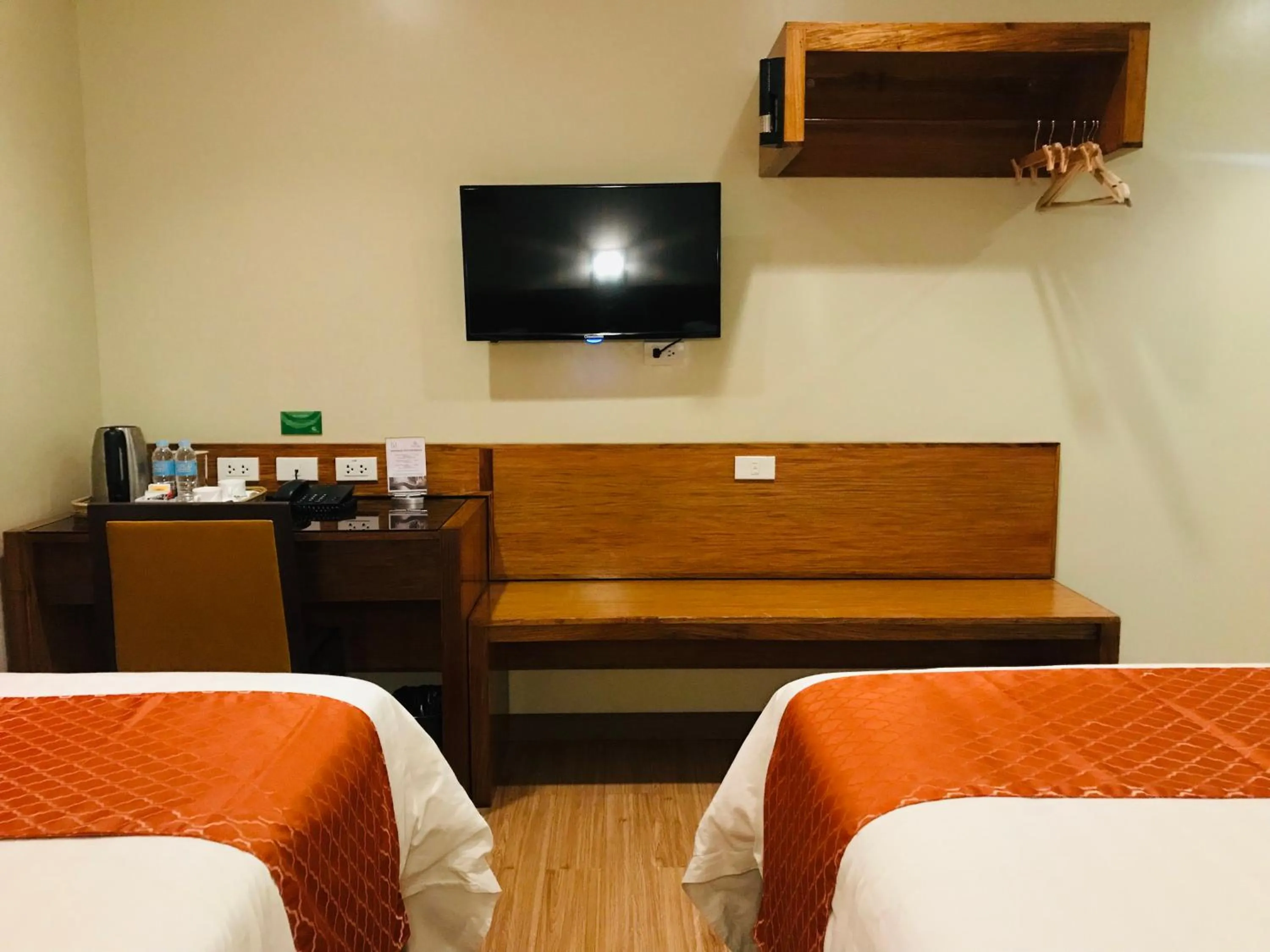 Bed in Coron Soleil Express Hotel
