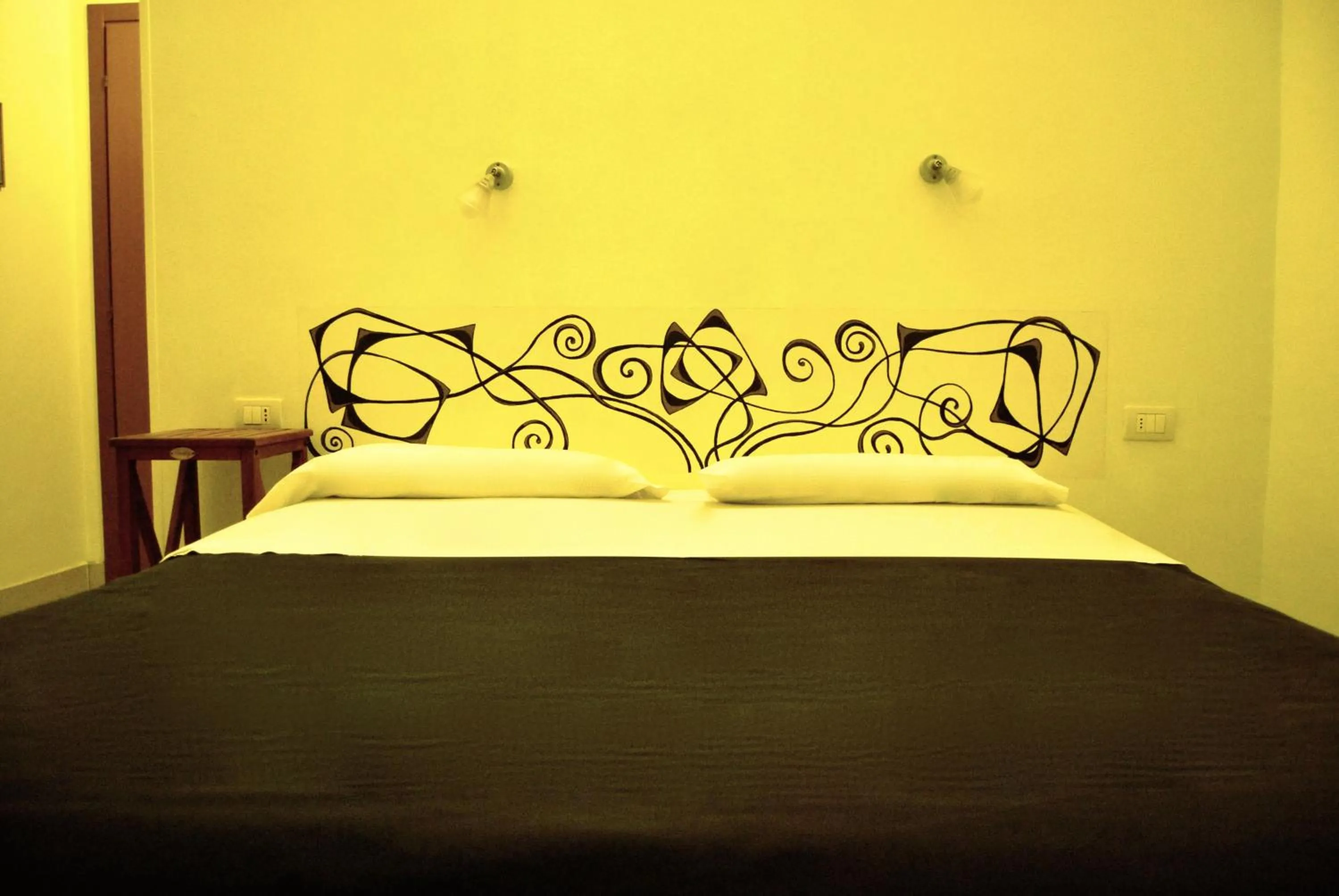 Bed in AlbergoTeatro