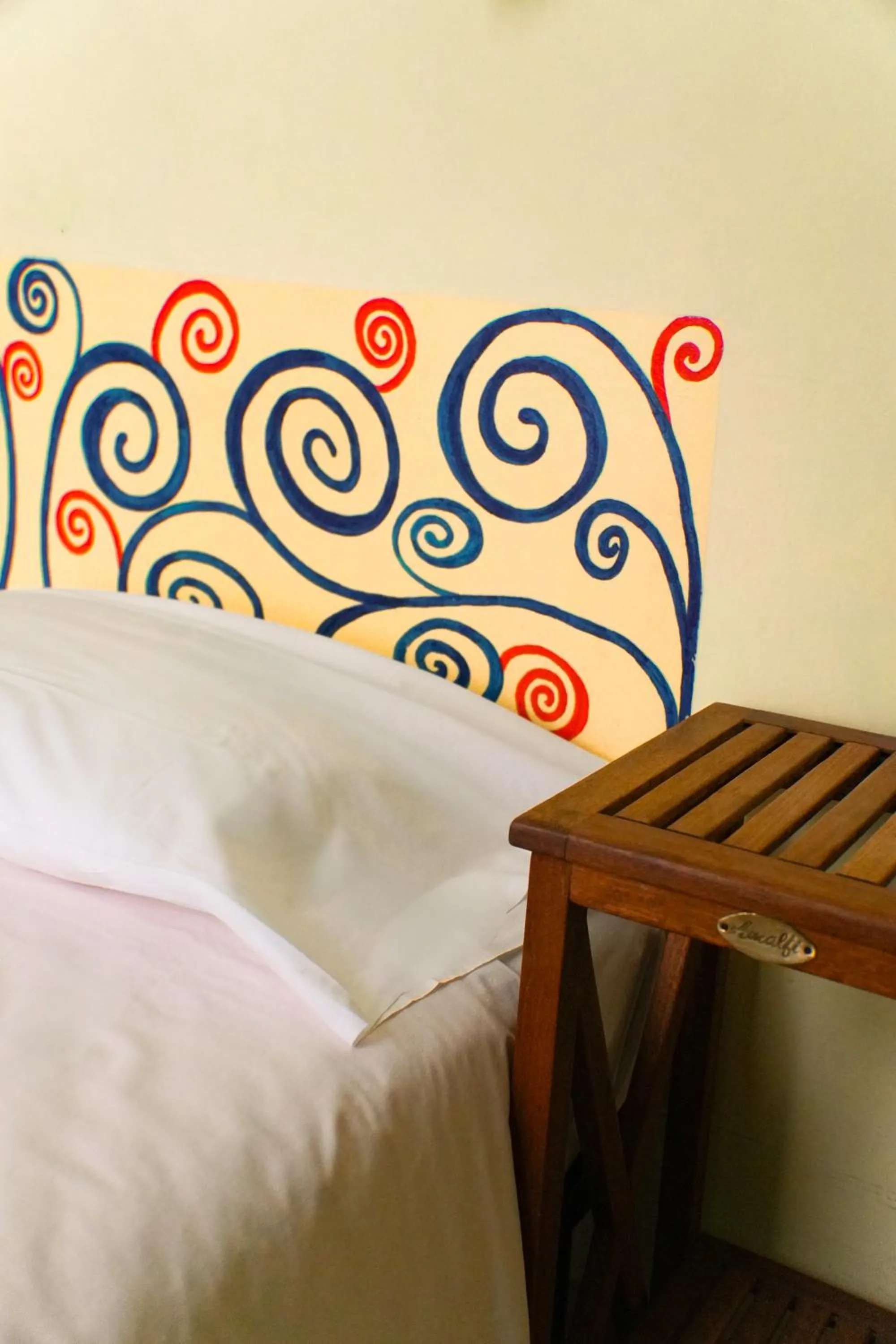 Decorative detail, Bed in AlbergoTeatro