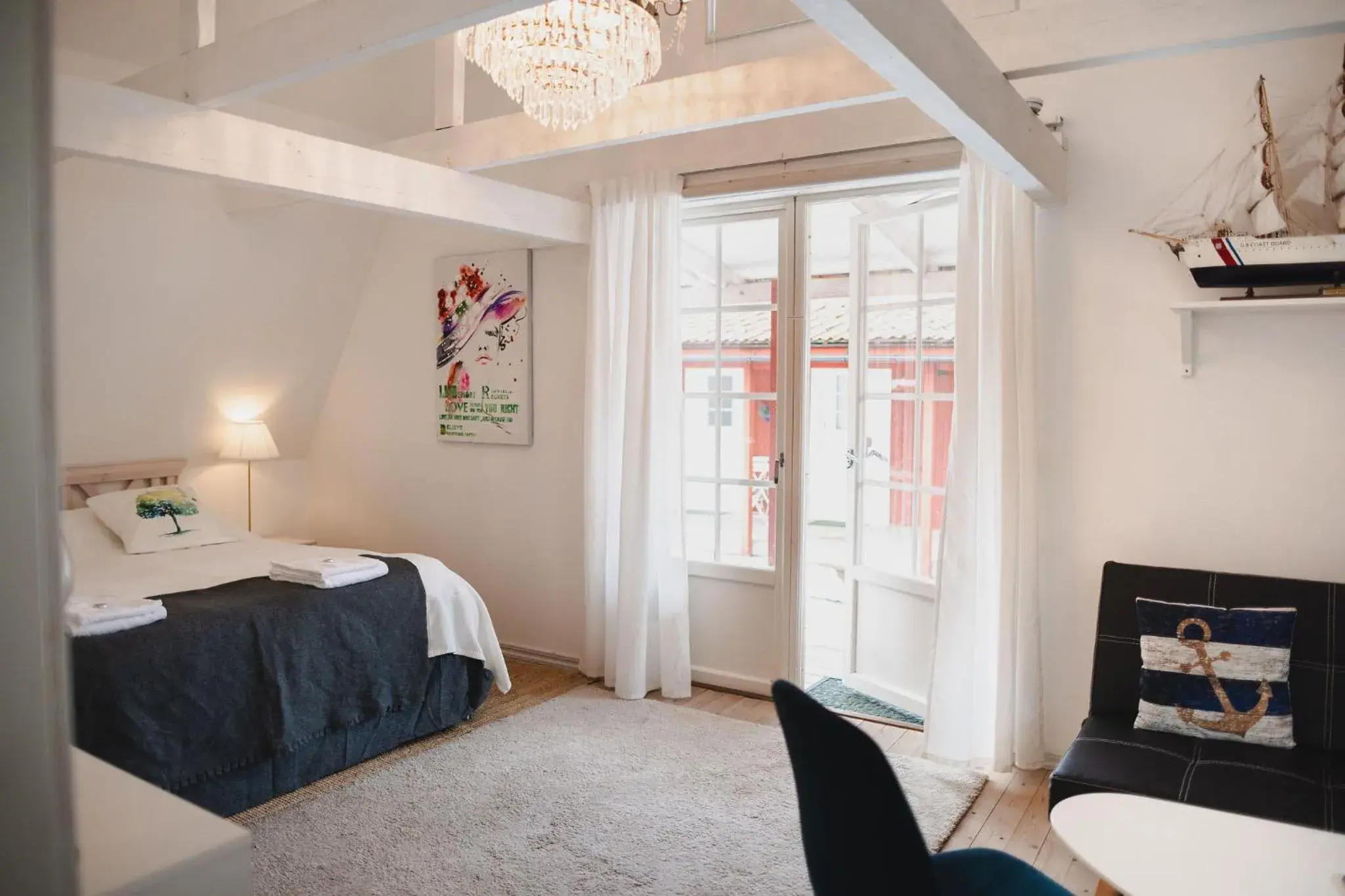 Deluxe Double Room with Balcony - single occupancy in Gårdshotell Klockargården Öregrund Deluxe Double Room with Balcony - single occupancy in Gårdshotell Klockargården Öregrund