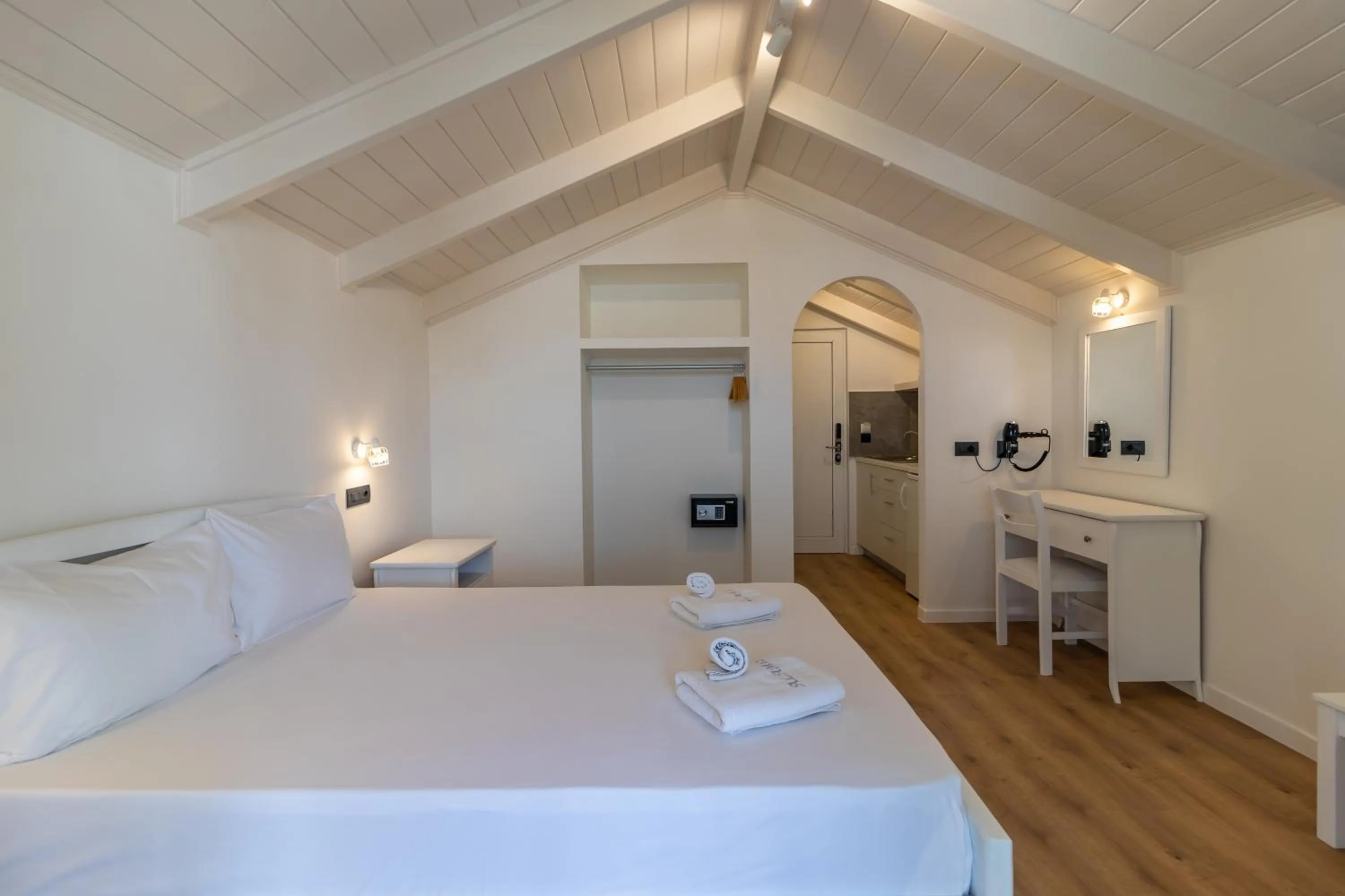 Bed in Alamis Hotel & Apartments