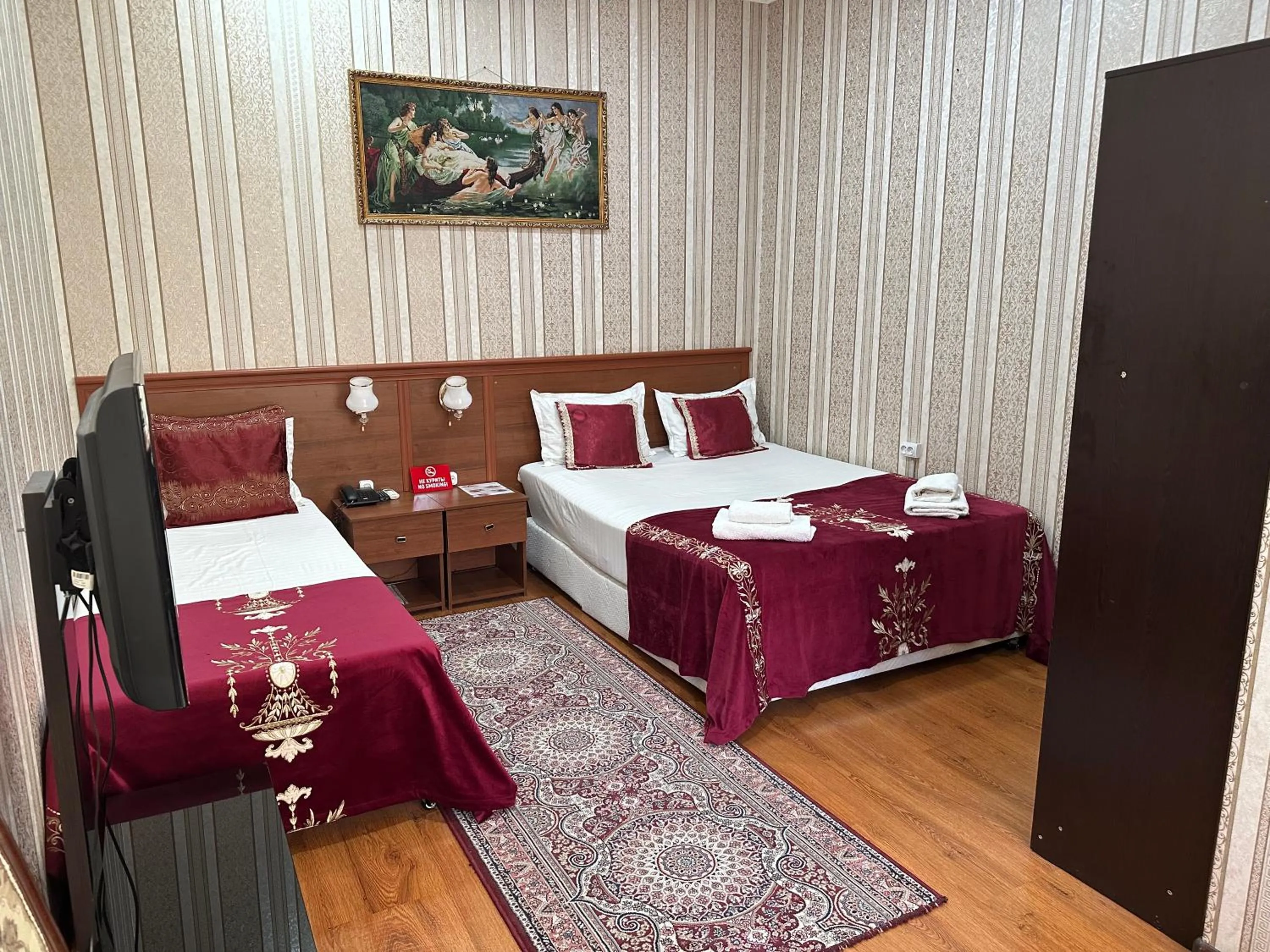 Bed in Sarbon Hotel Tashkent
