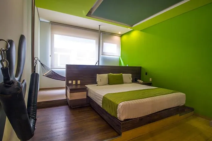 Bed in Hotel y Villas Natura