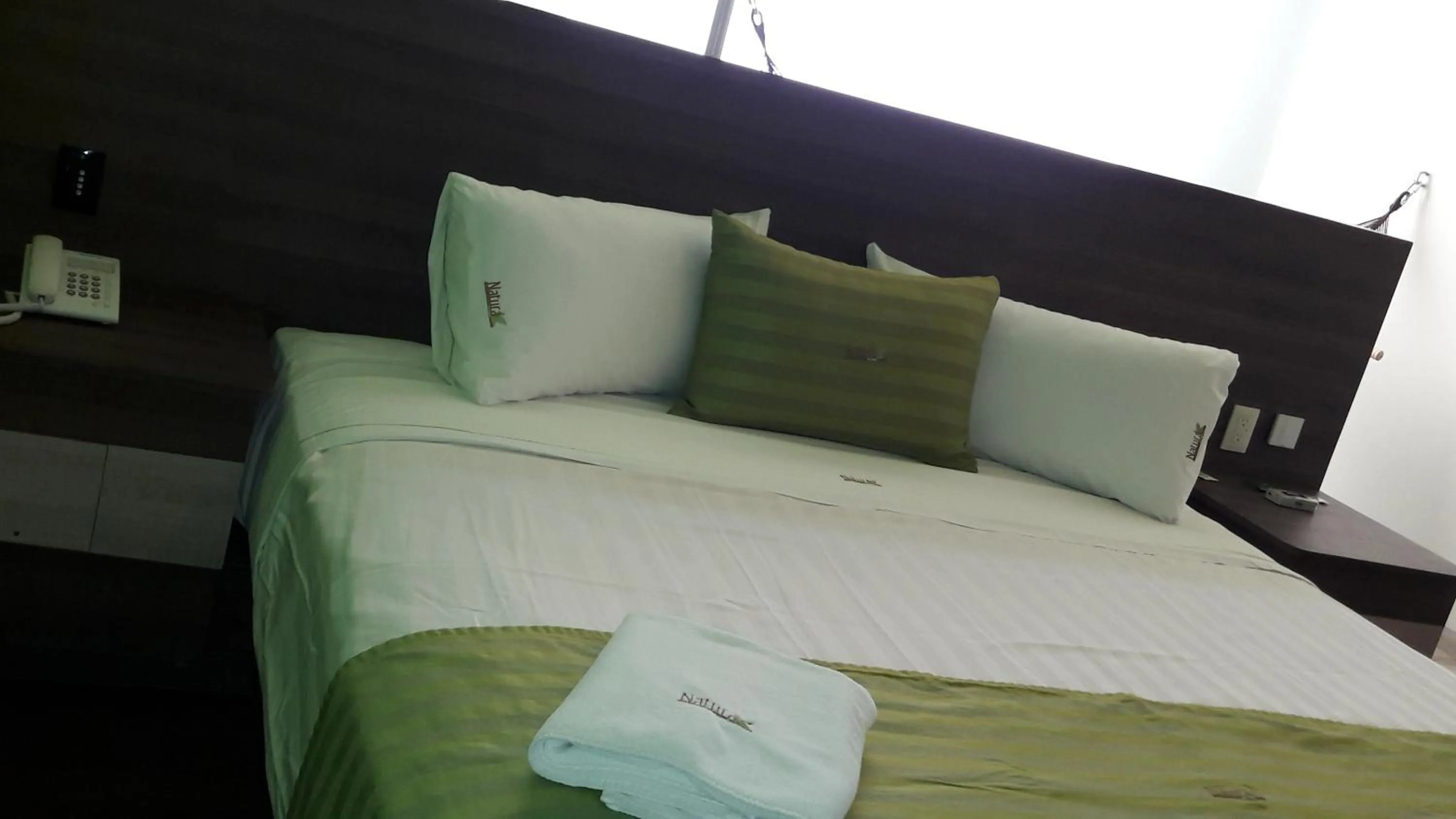 Bed in Hotel y Villas Natura