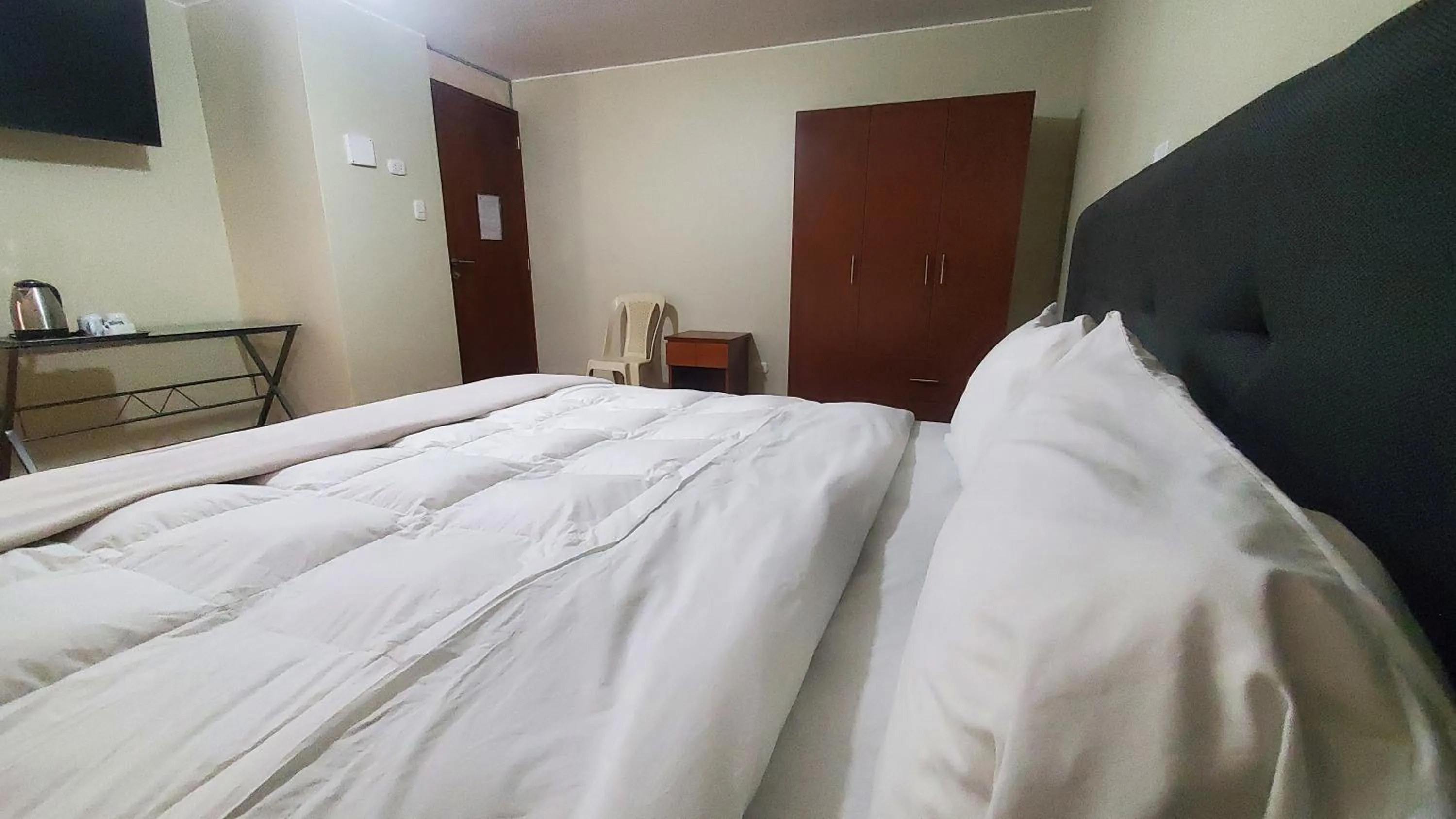 Bed in Hotel Wanka Palace