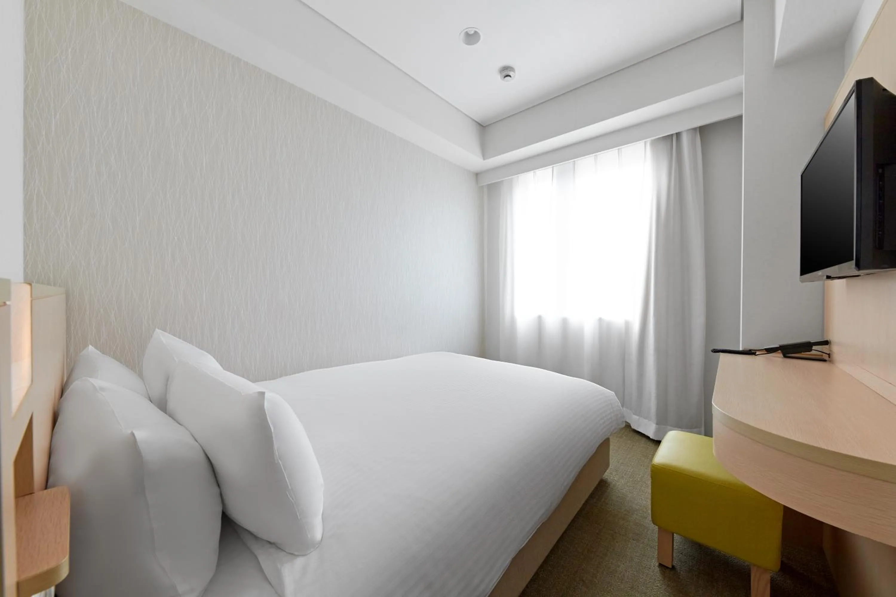 Bed in Sotetsu Fresa Inn Kyoto-Hachijoguchi