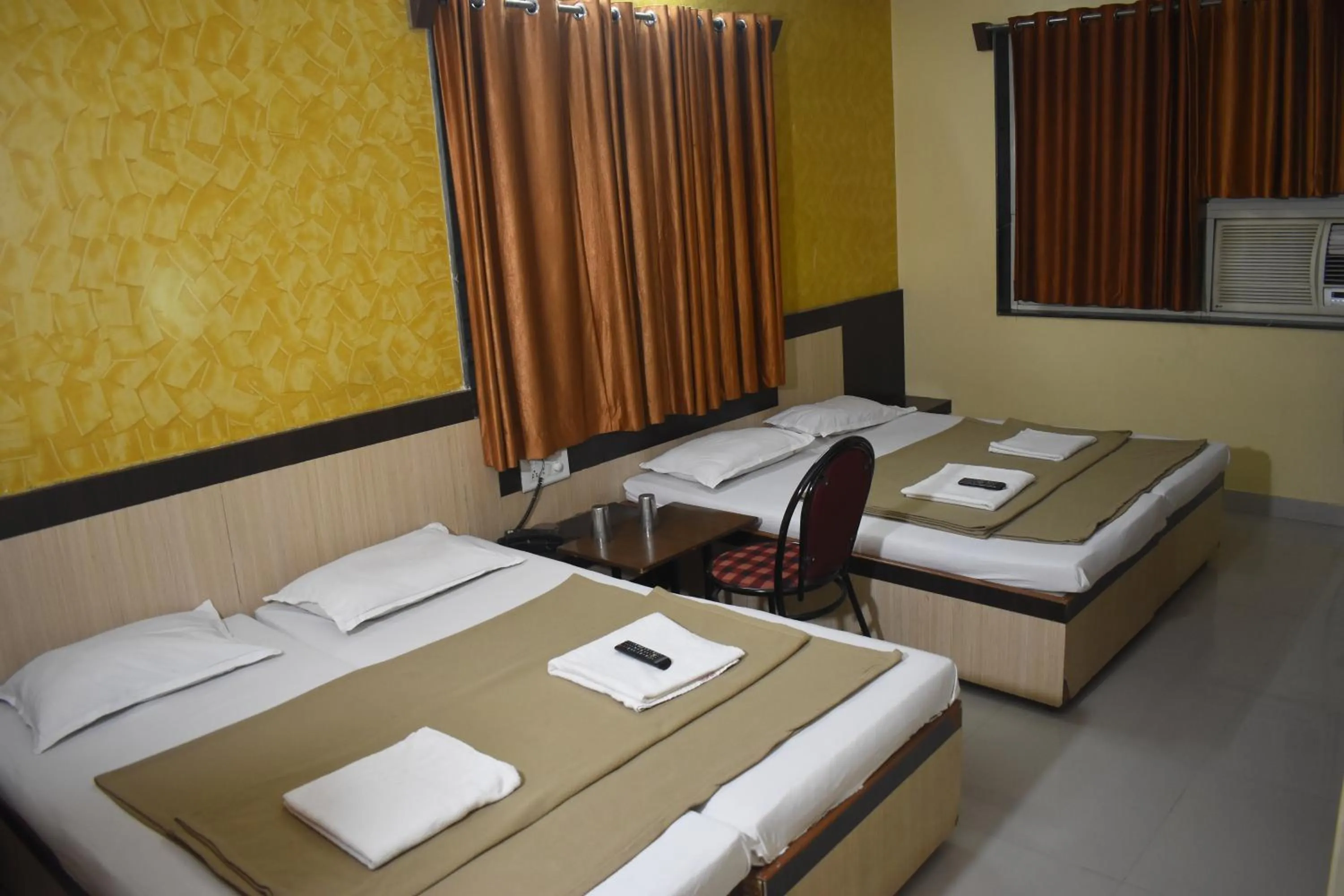 Bed in Hotel Sai Vishwa