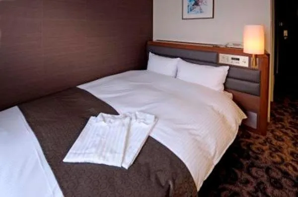 Bed in Hotel Plaza Kachigawa