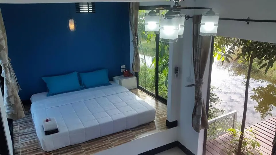 Photo of the whole room, Bed in T'Luck House Resort