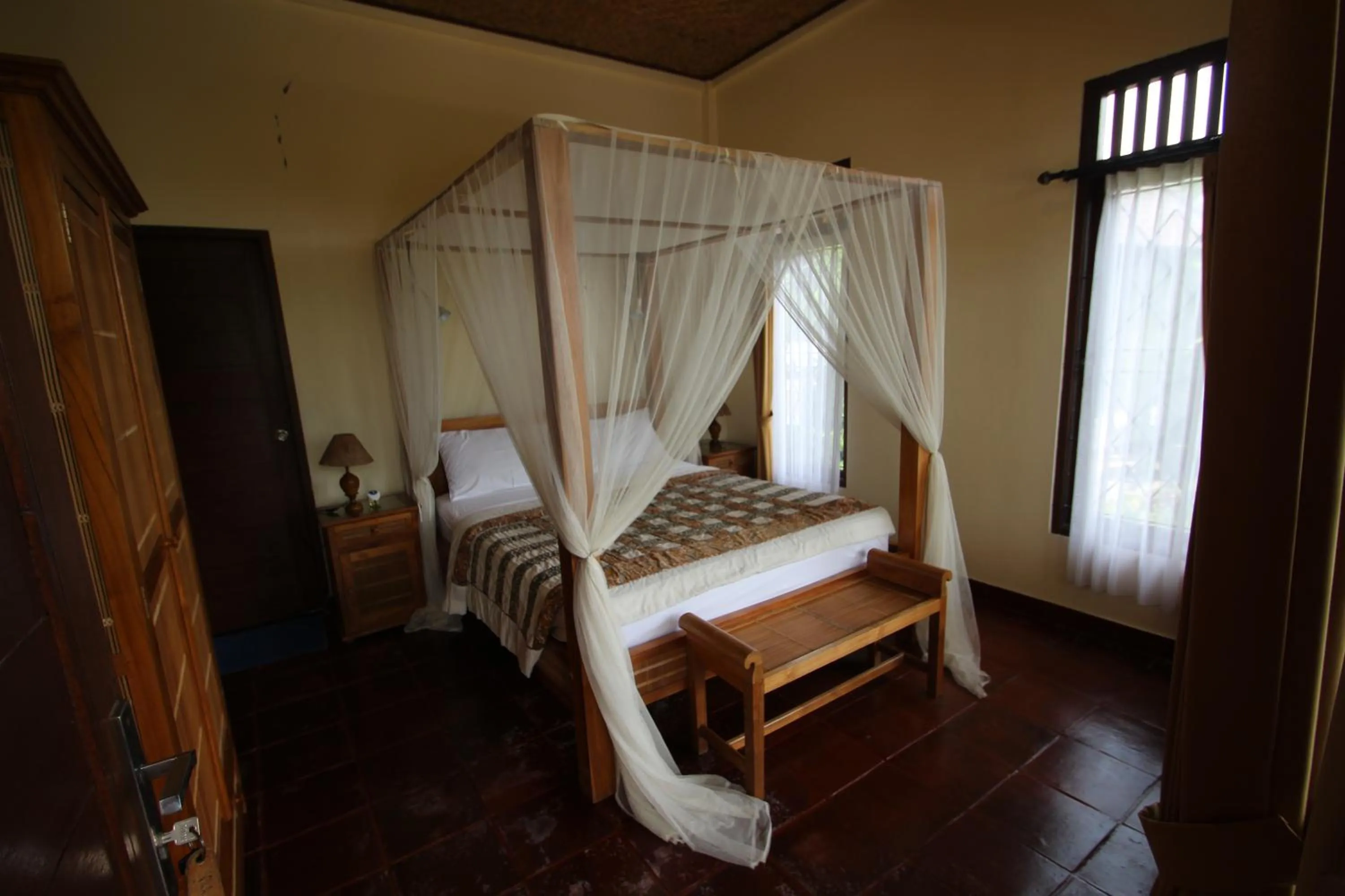 Bed in Uma Capung Mas Cottage