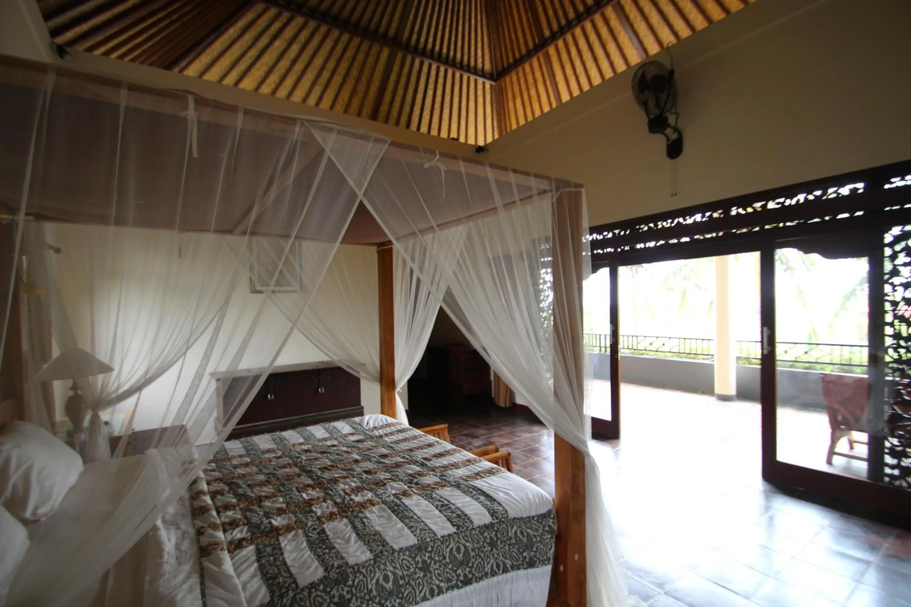 Bed in Uma Capung Mas Cottage