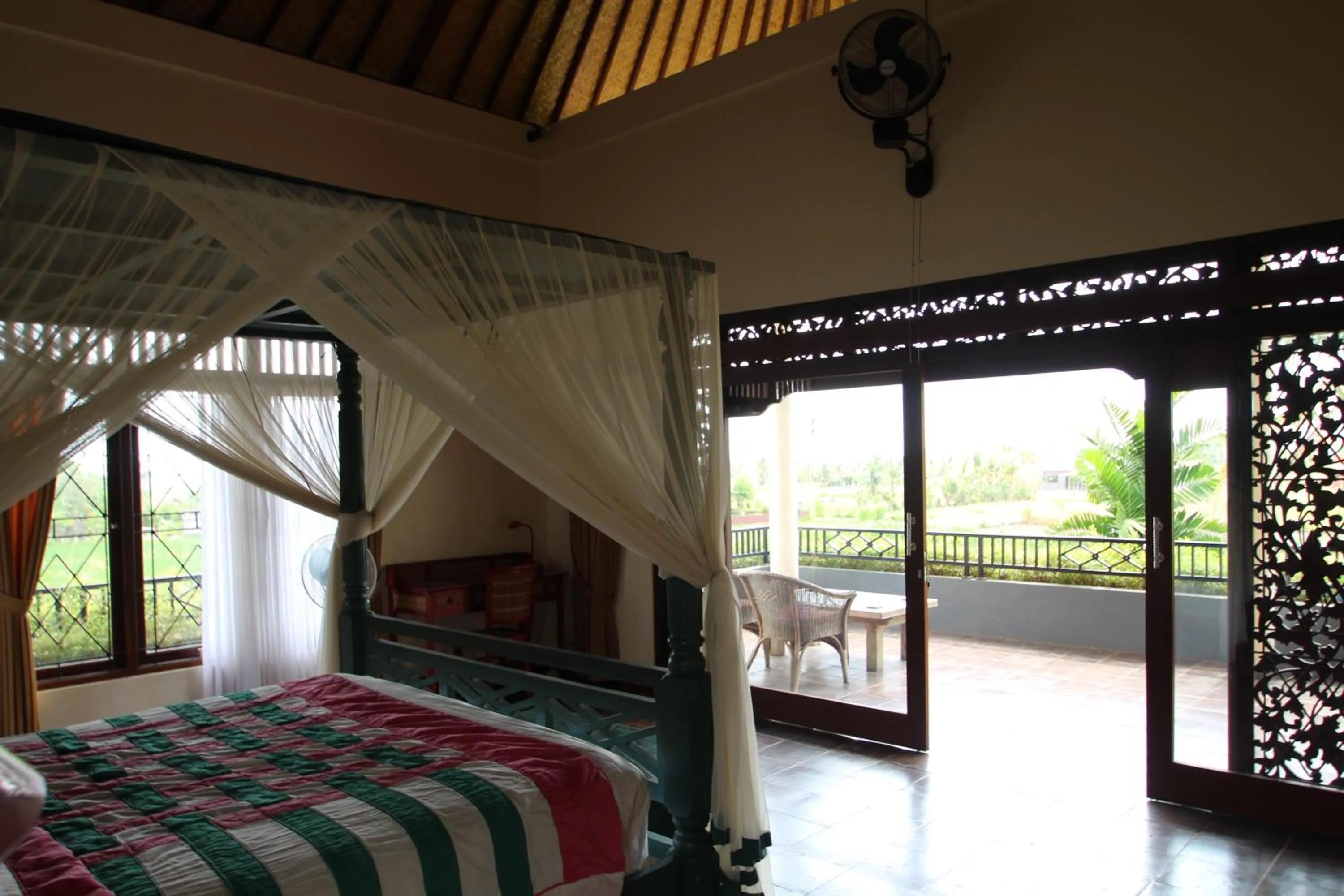 Bed in Uma Capung Mas Cottage
