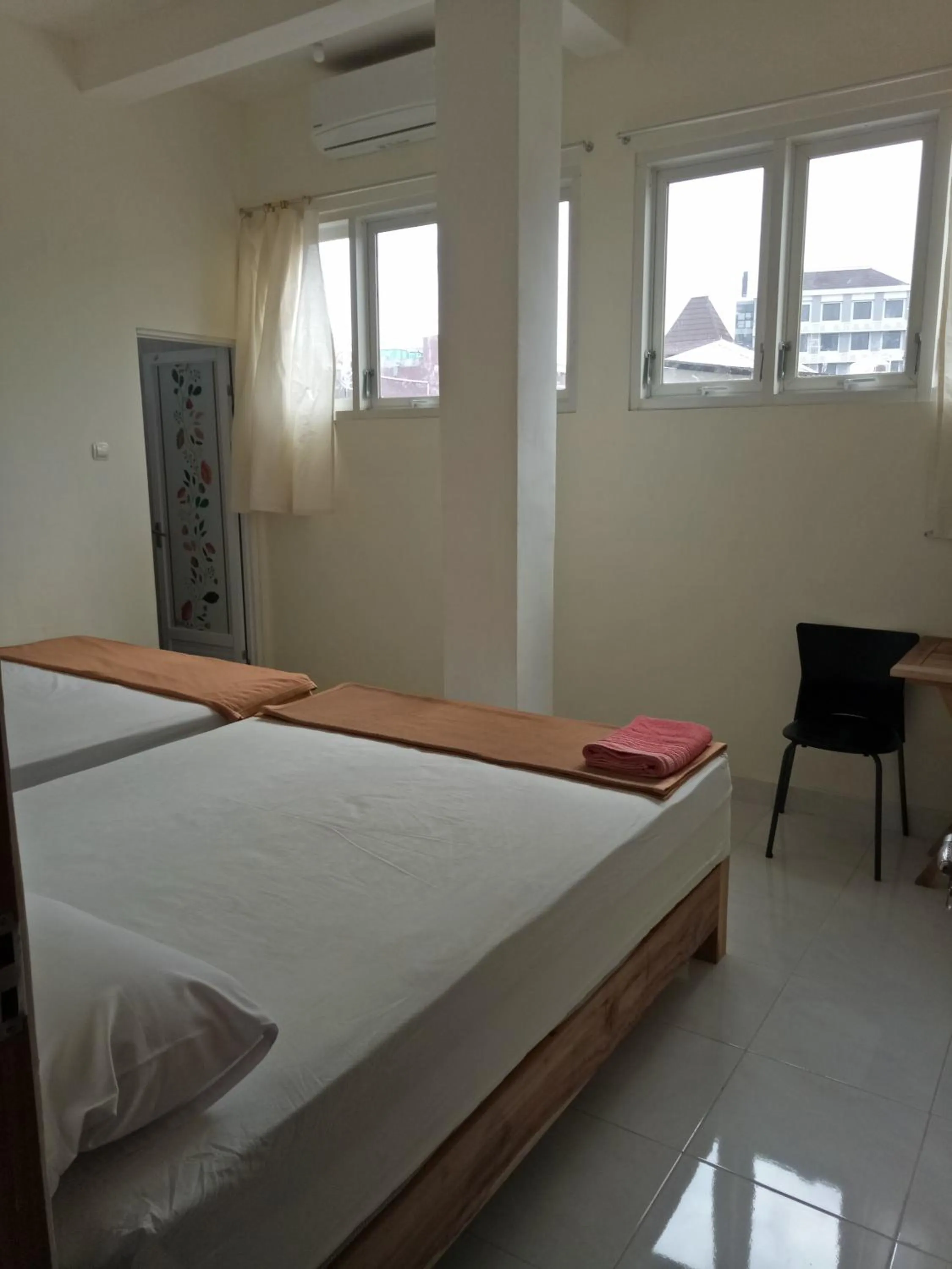 Bed in Losmen Fadel Malioboro Jogja