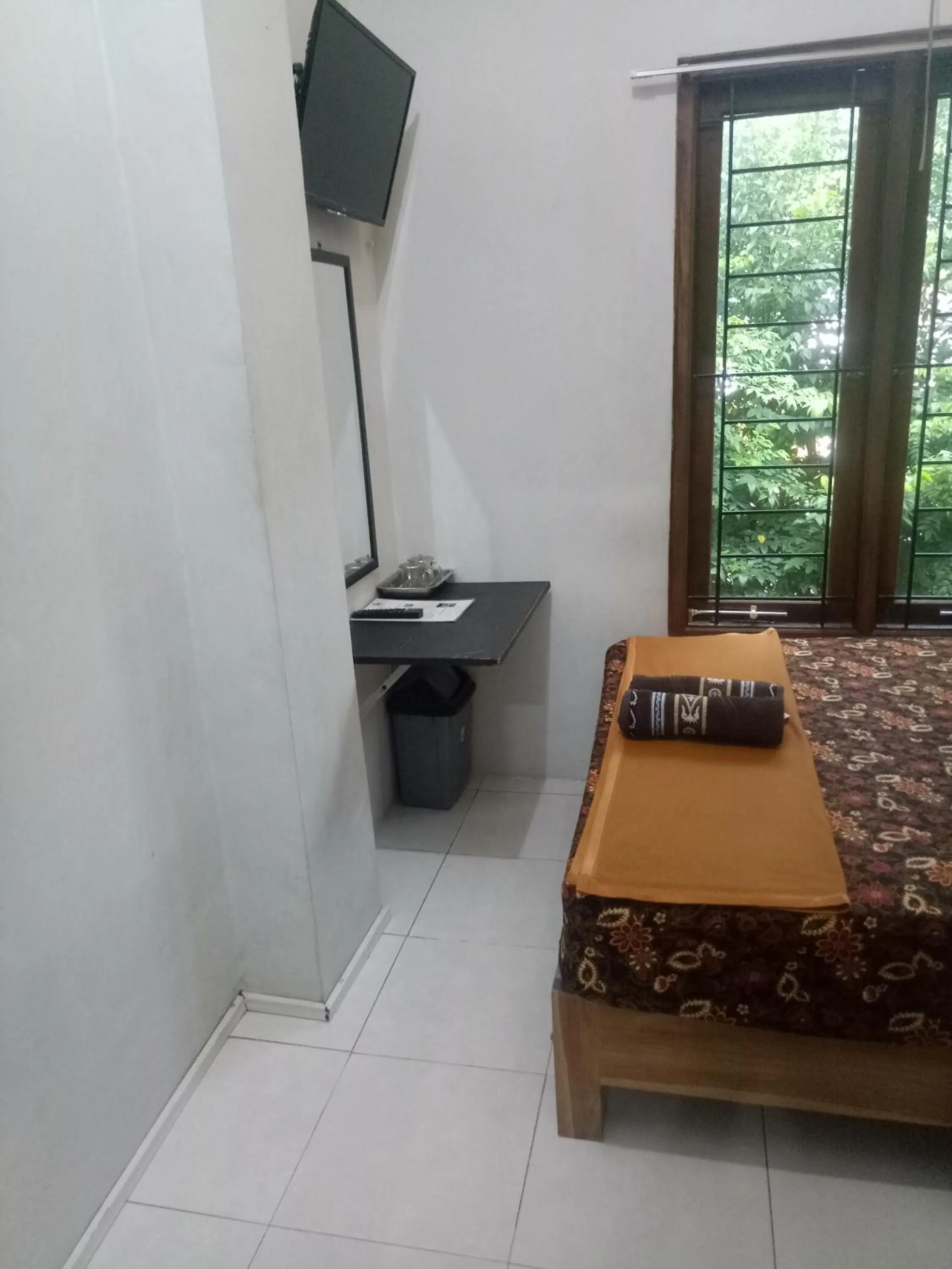 Property building, Bed in Losmen Fadel Malioboro Jogja
