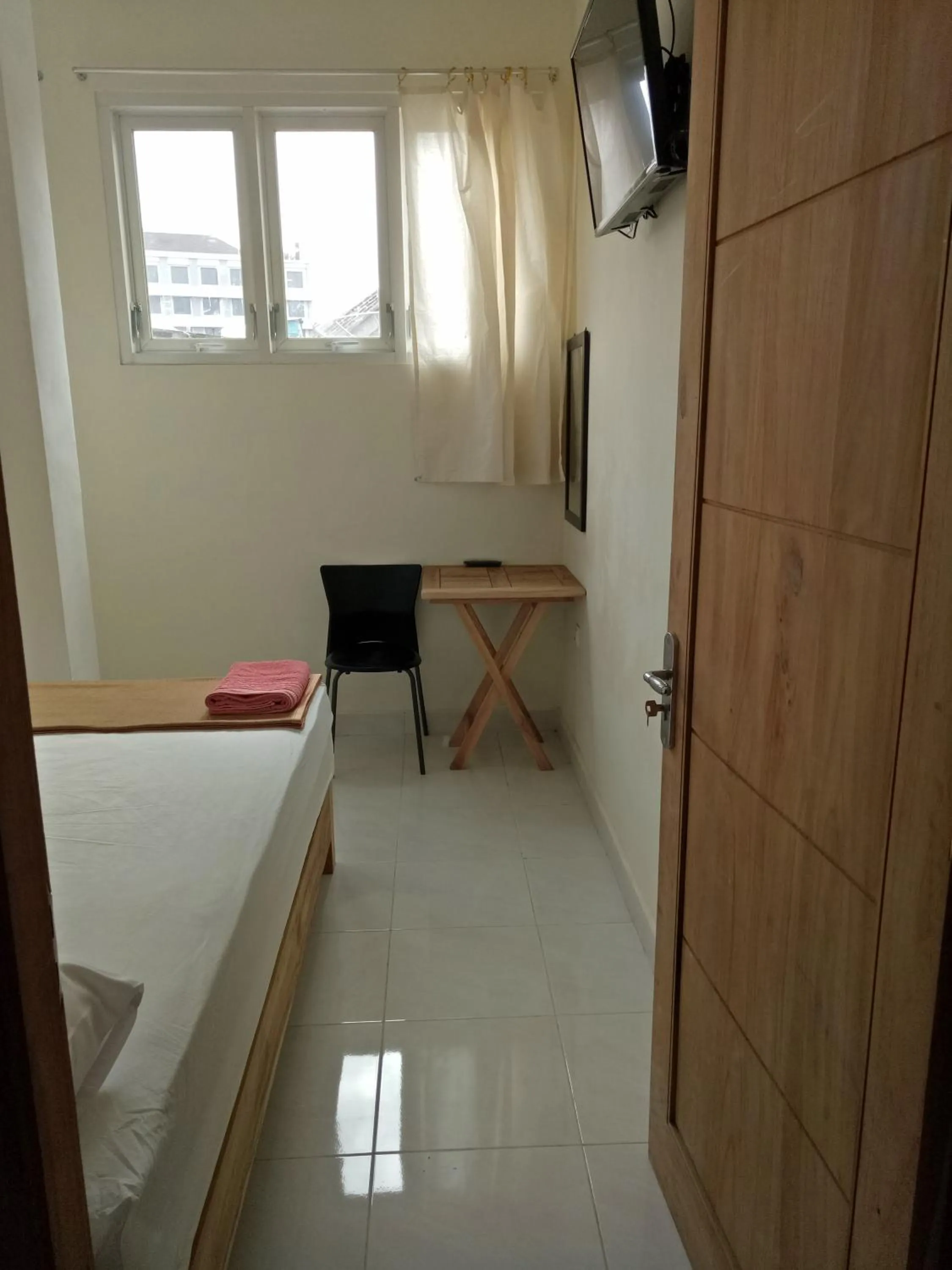 Bed in Losmen Fadel Malioboro Jogja