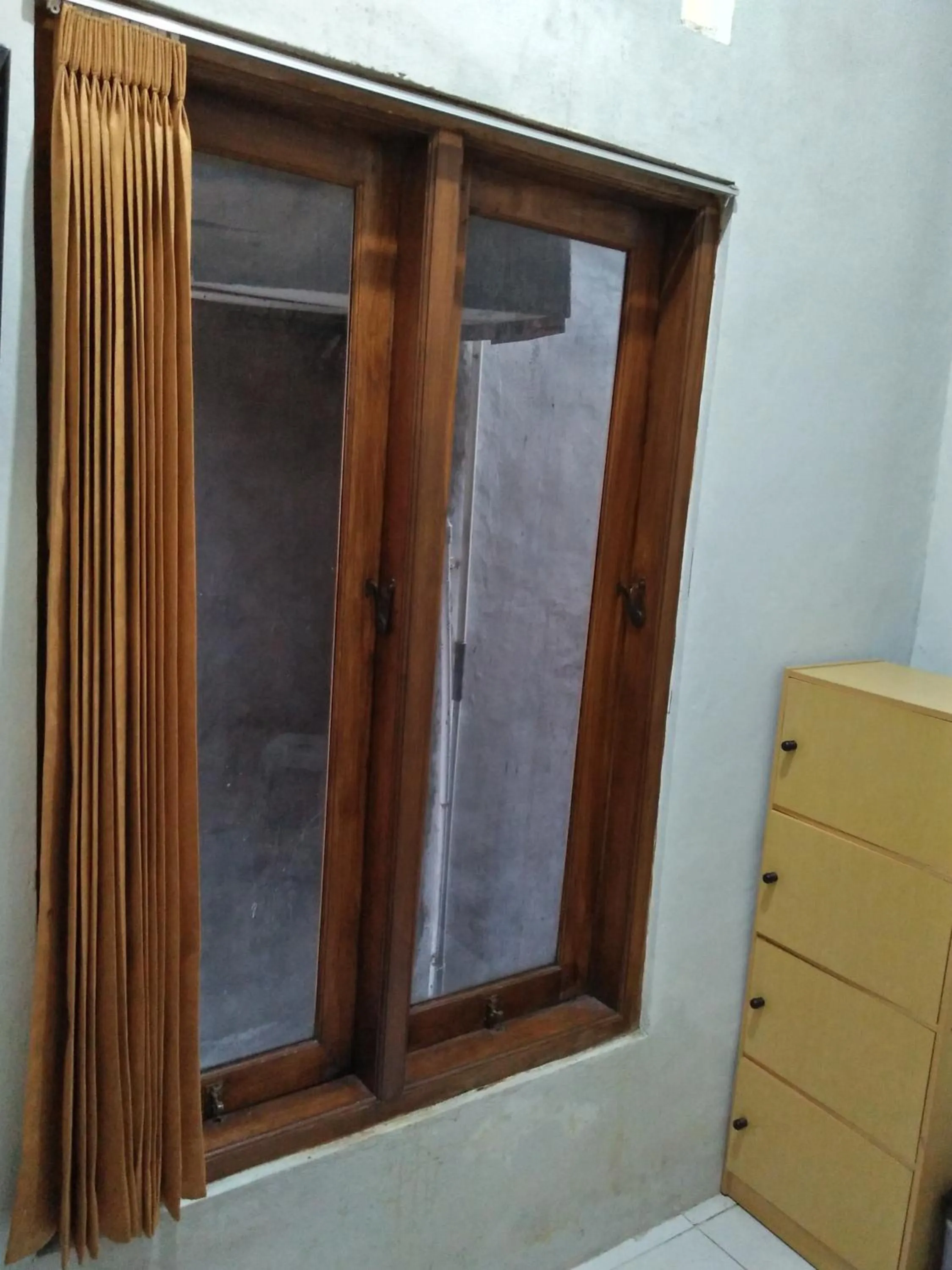 Bedroom in Losmen Fadel Malioboro Jogja