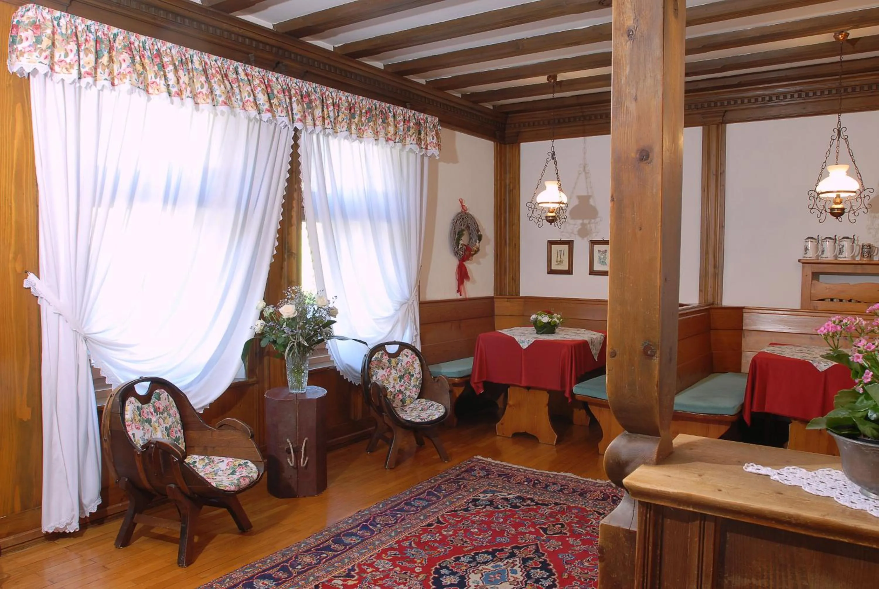 Communal lounge/ TV room in Dolomiti Sport Hotel