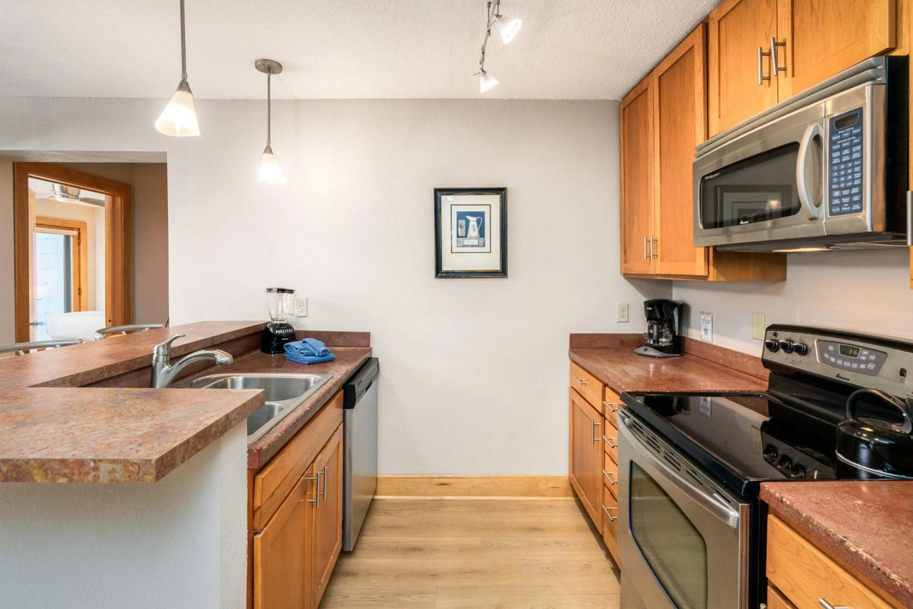 Kitchen or kitchenette in East Bay Suites