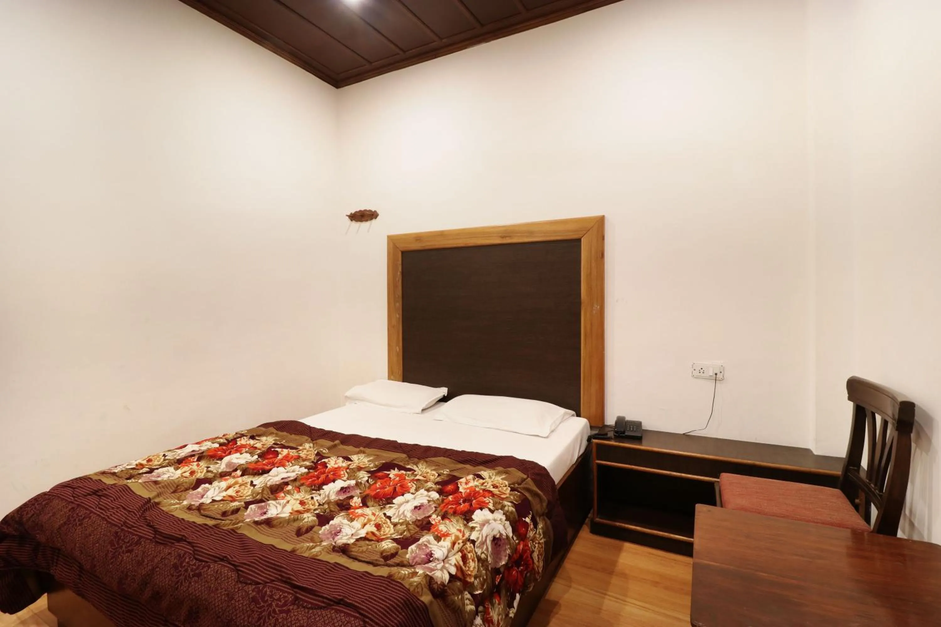 Bed in Hotel Himalayan Club