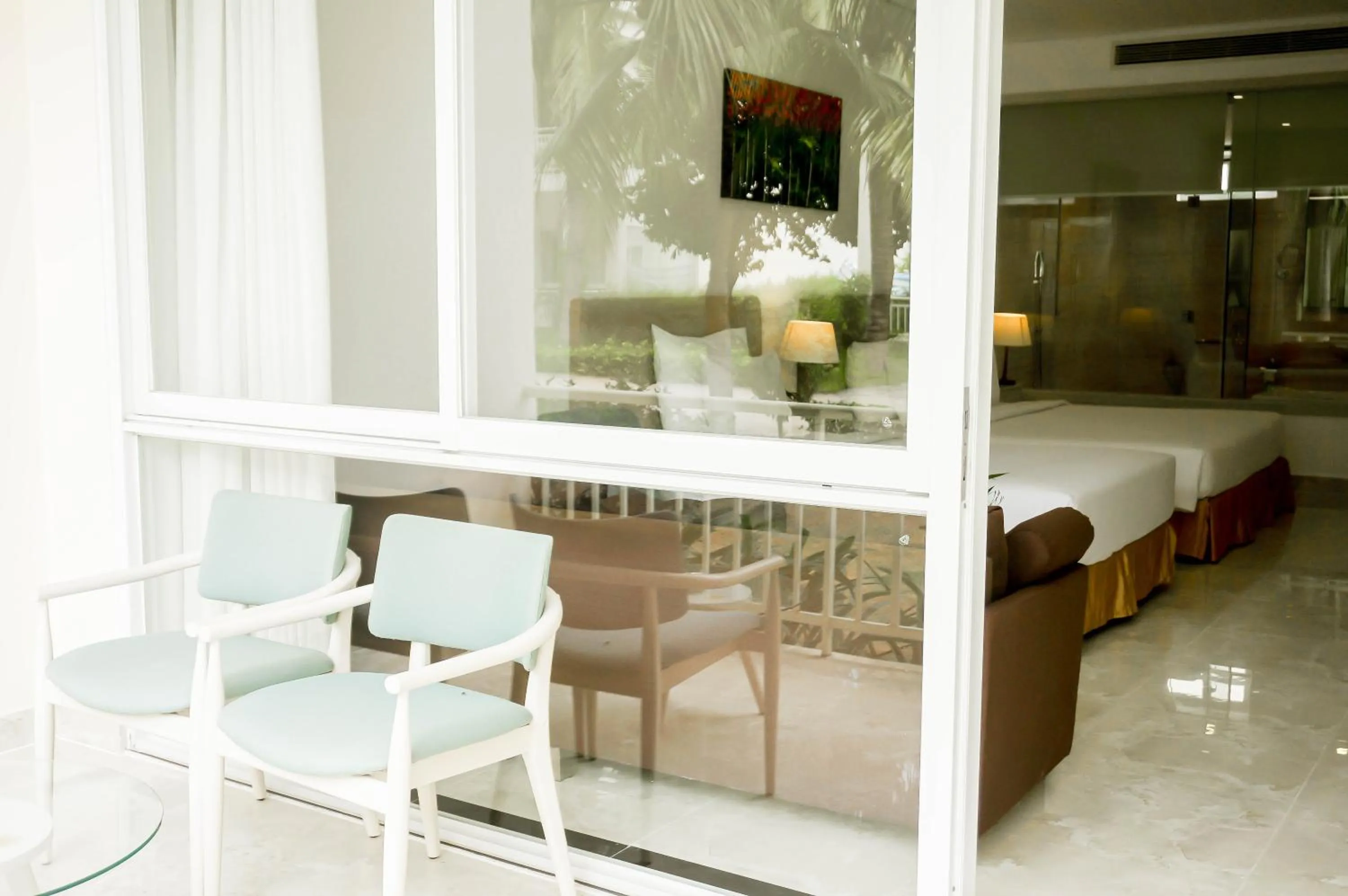 Seating area, Bed in CostaBella Resort Nha Trang