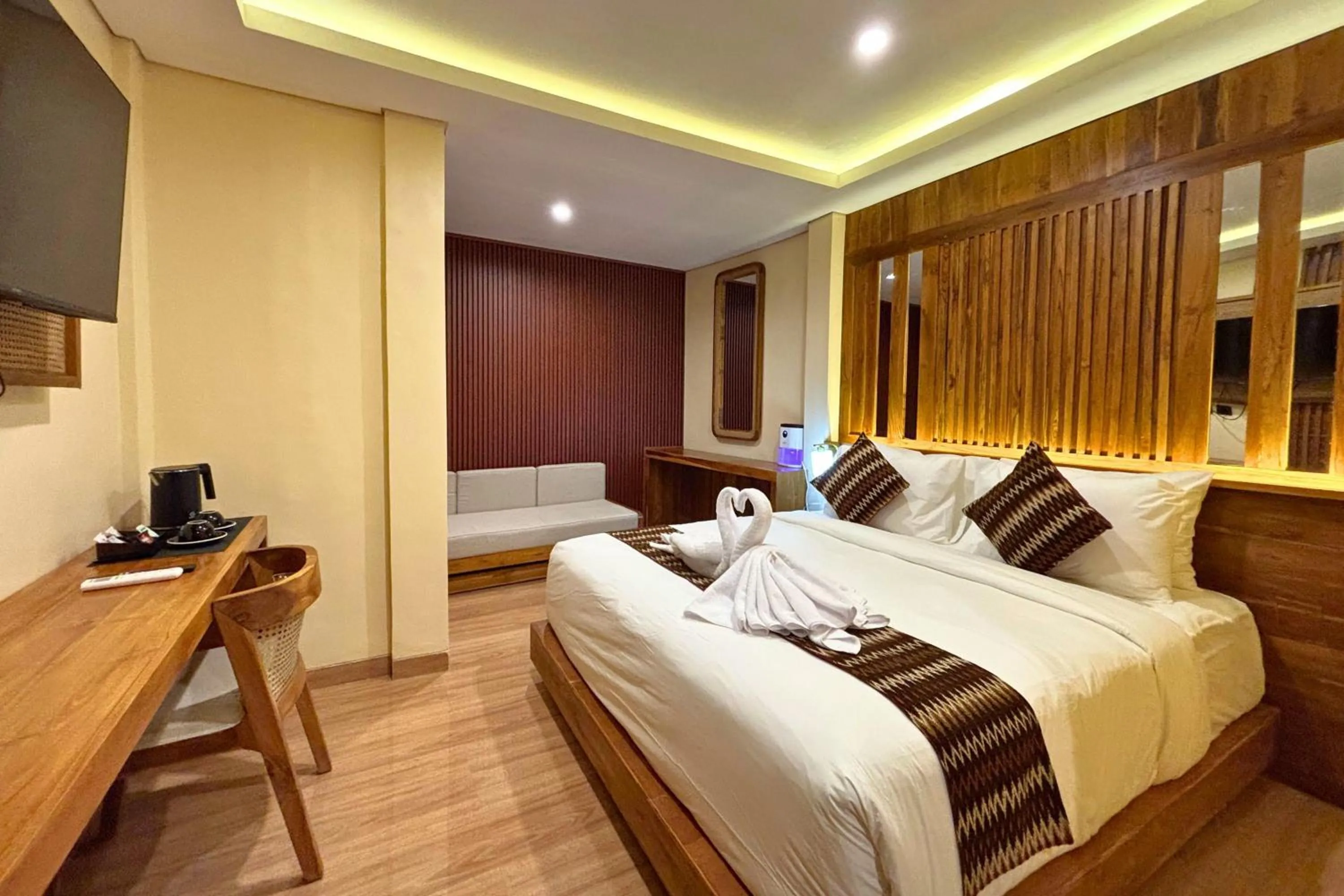 Seating area, Bed in AB Hotel Kuta