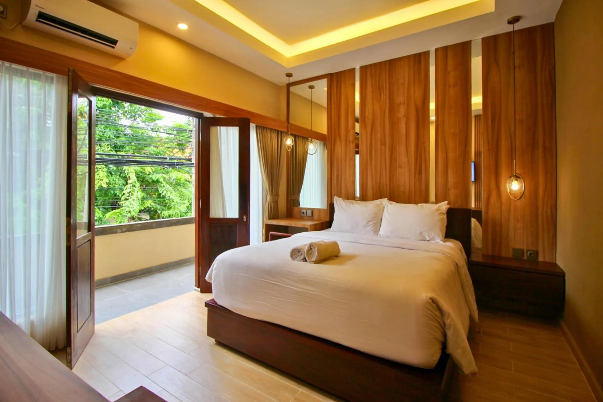 Bed in AB Hotel Kuta