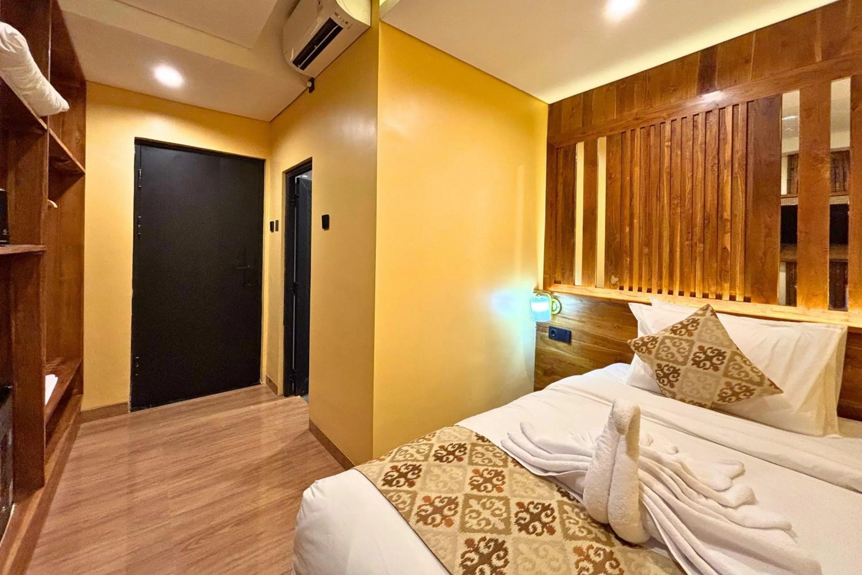 Bed in AB Hotel Kuta