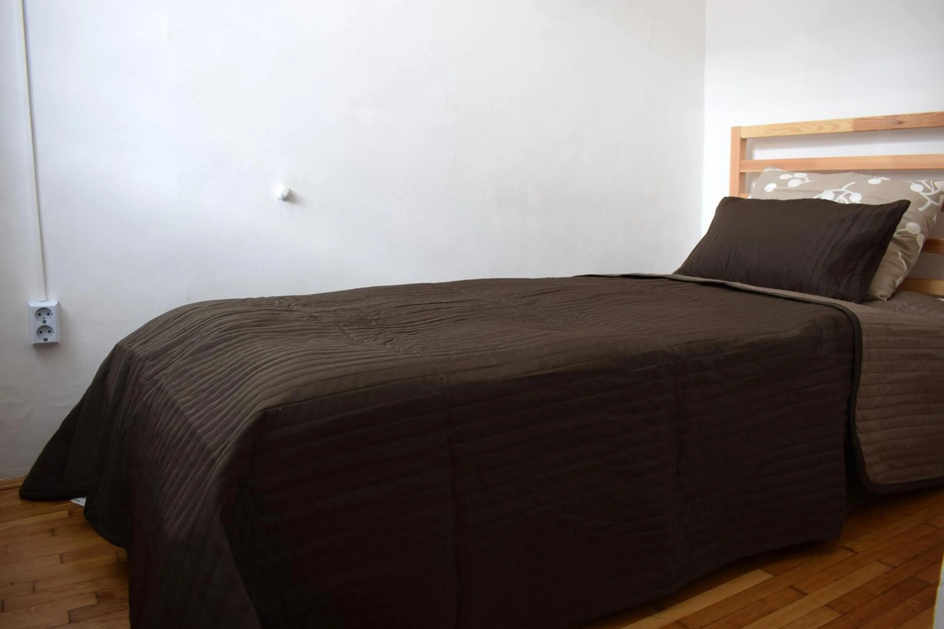 Bed in Diamond Astoria Apartments