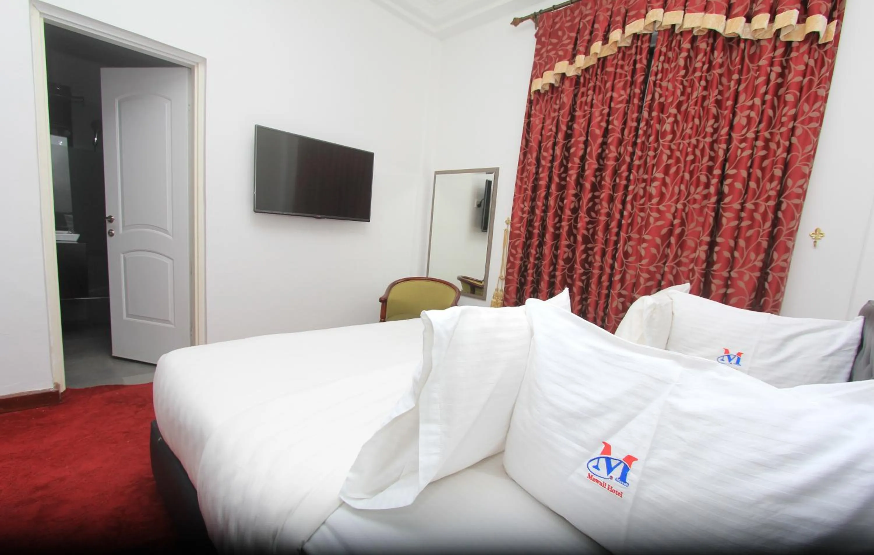 Bed in Mawuli Hotel