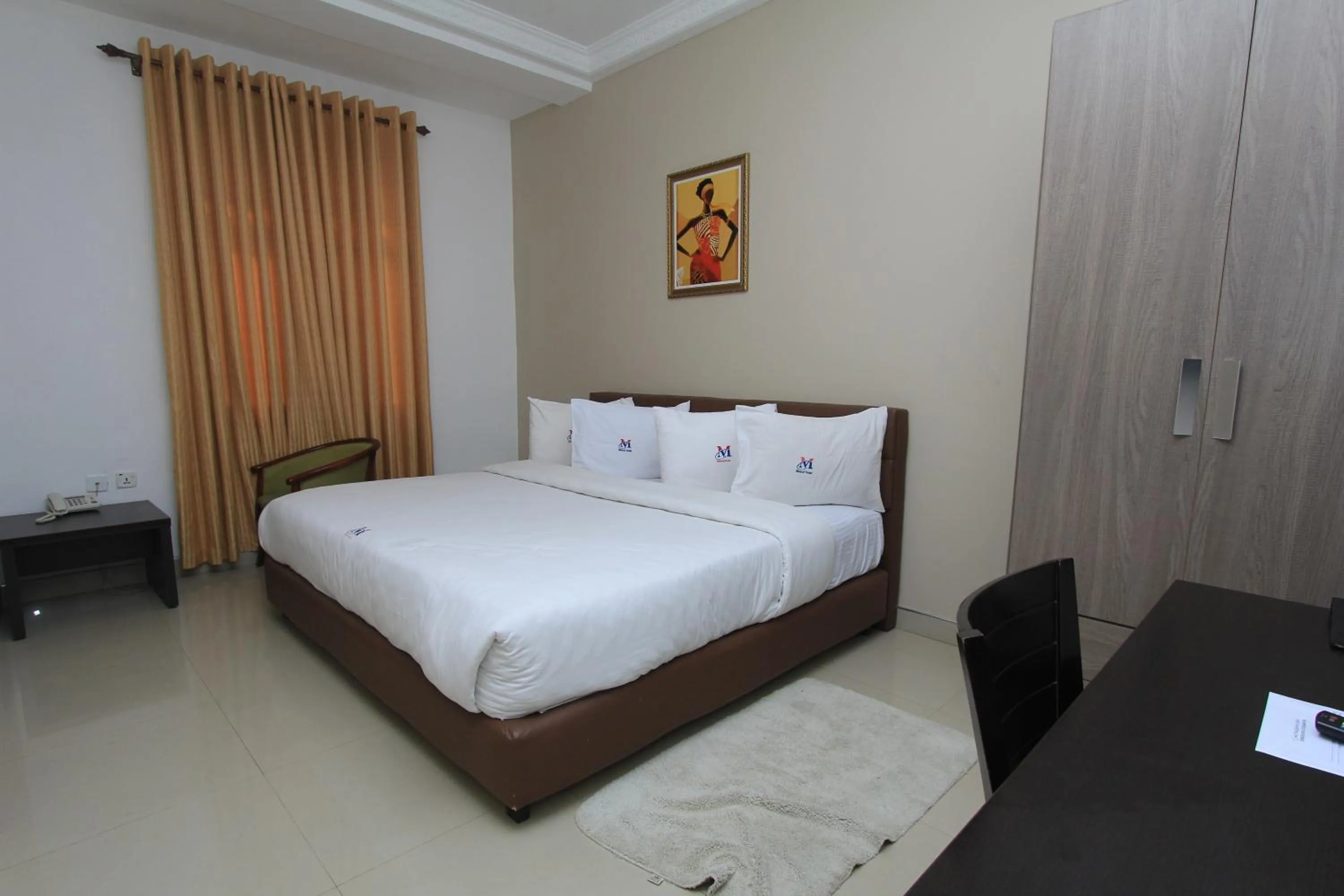Bed in Mawuli Hotel