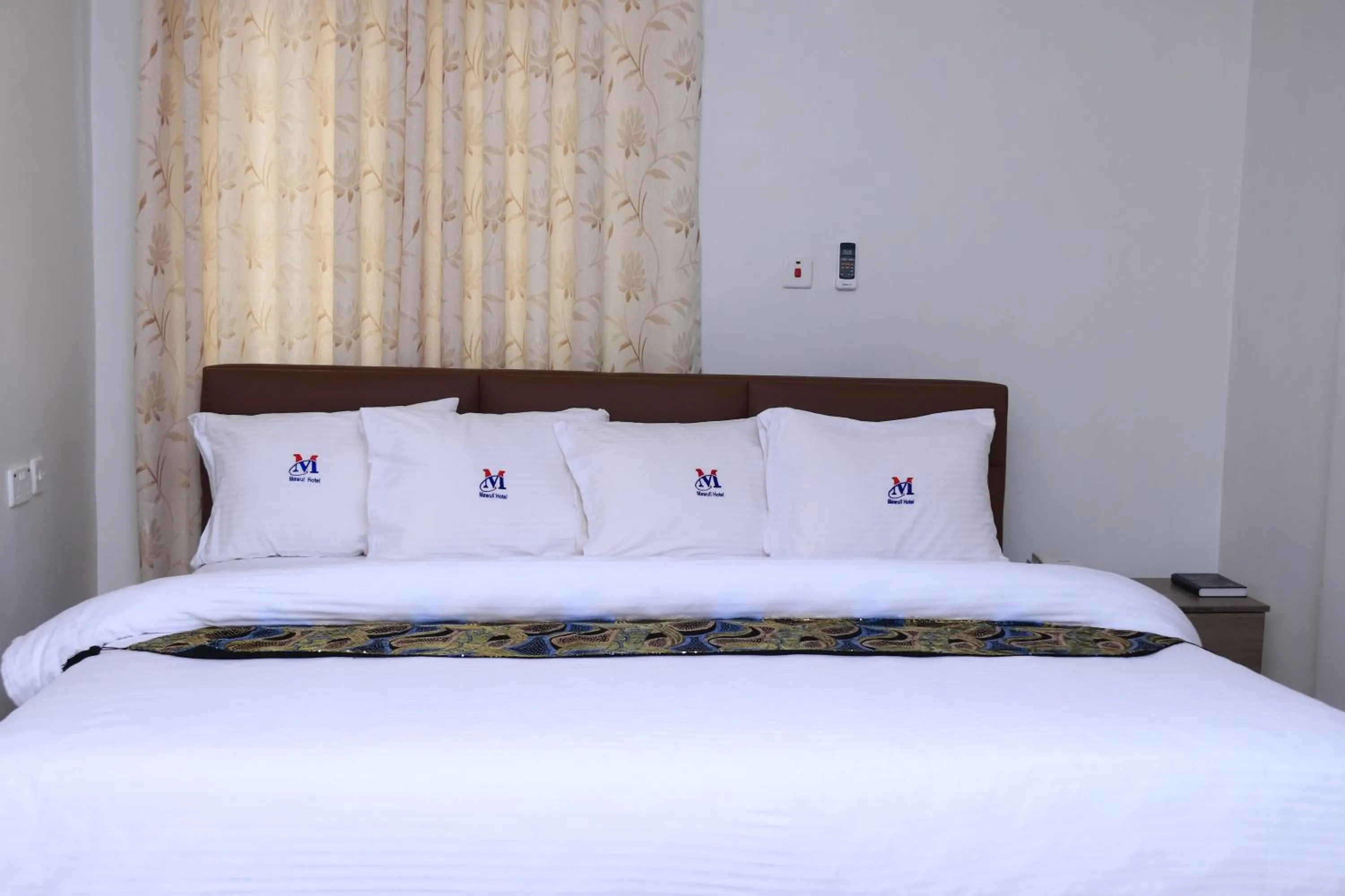 Bed in Mawuli Hotel