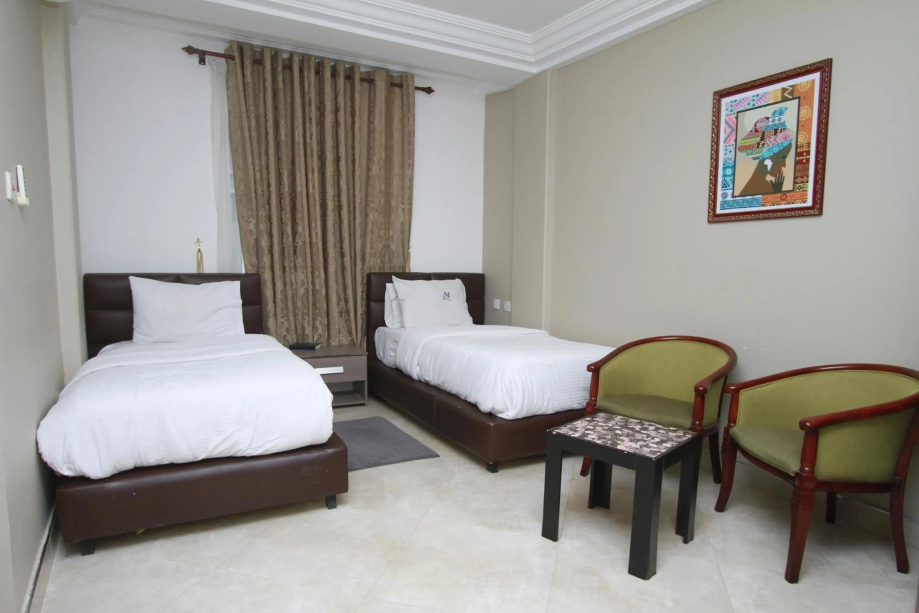 Bed in Mawuli Hotel