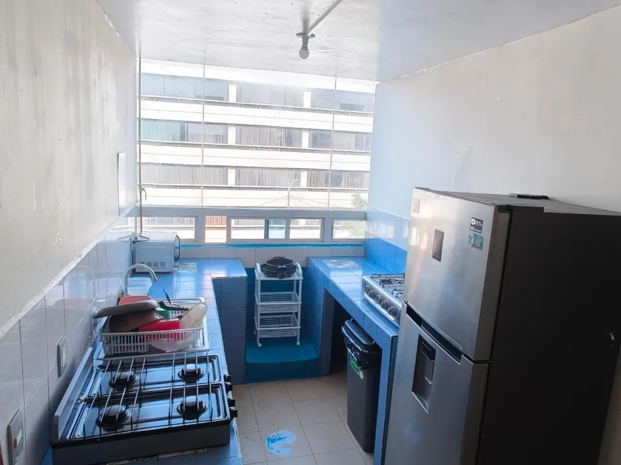 Communal kitchen in Hostal Ciudad de Mexico