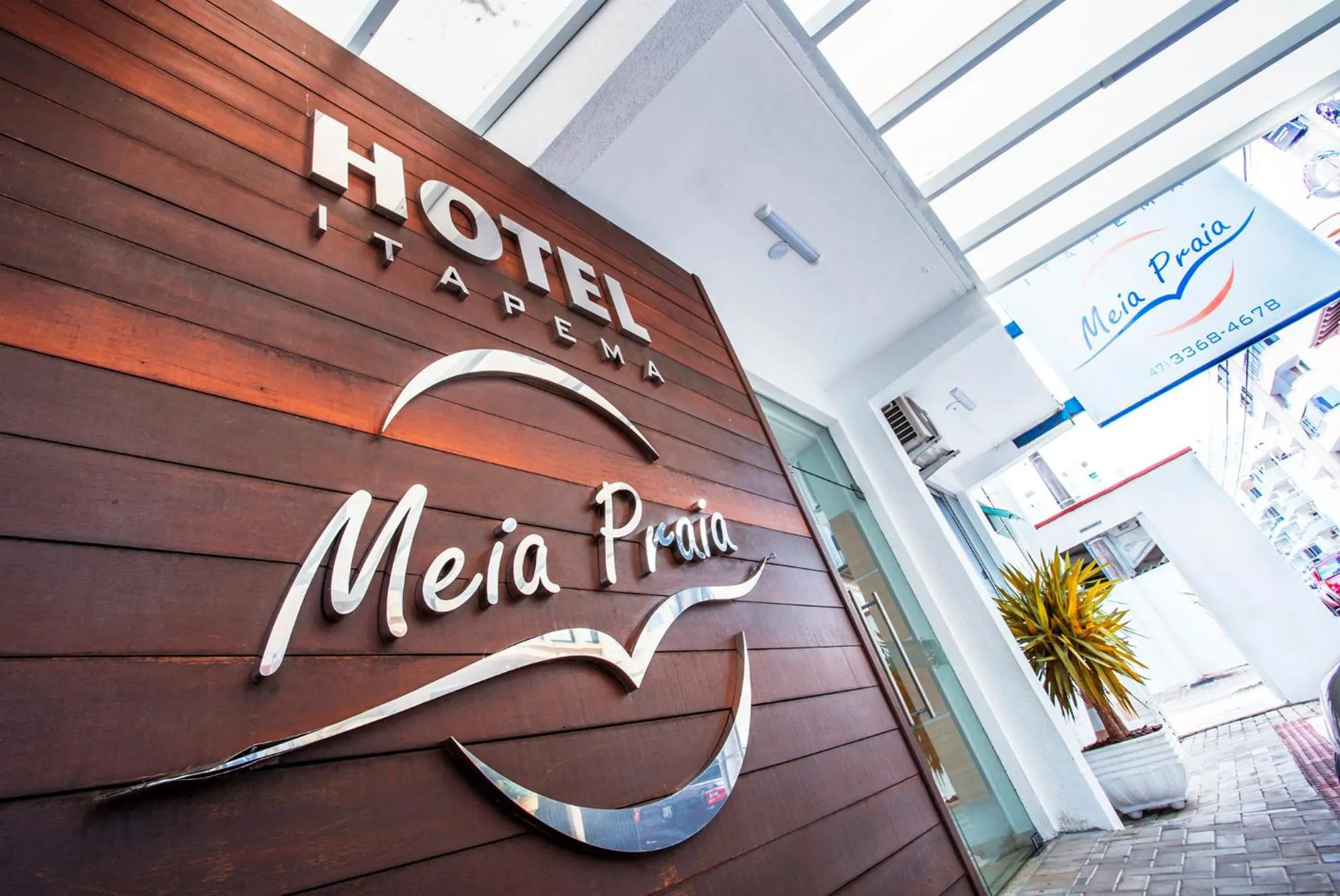 Property logo or sign in Hotel Itapema Meia Praia