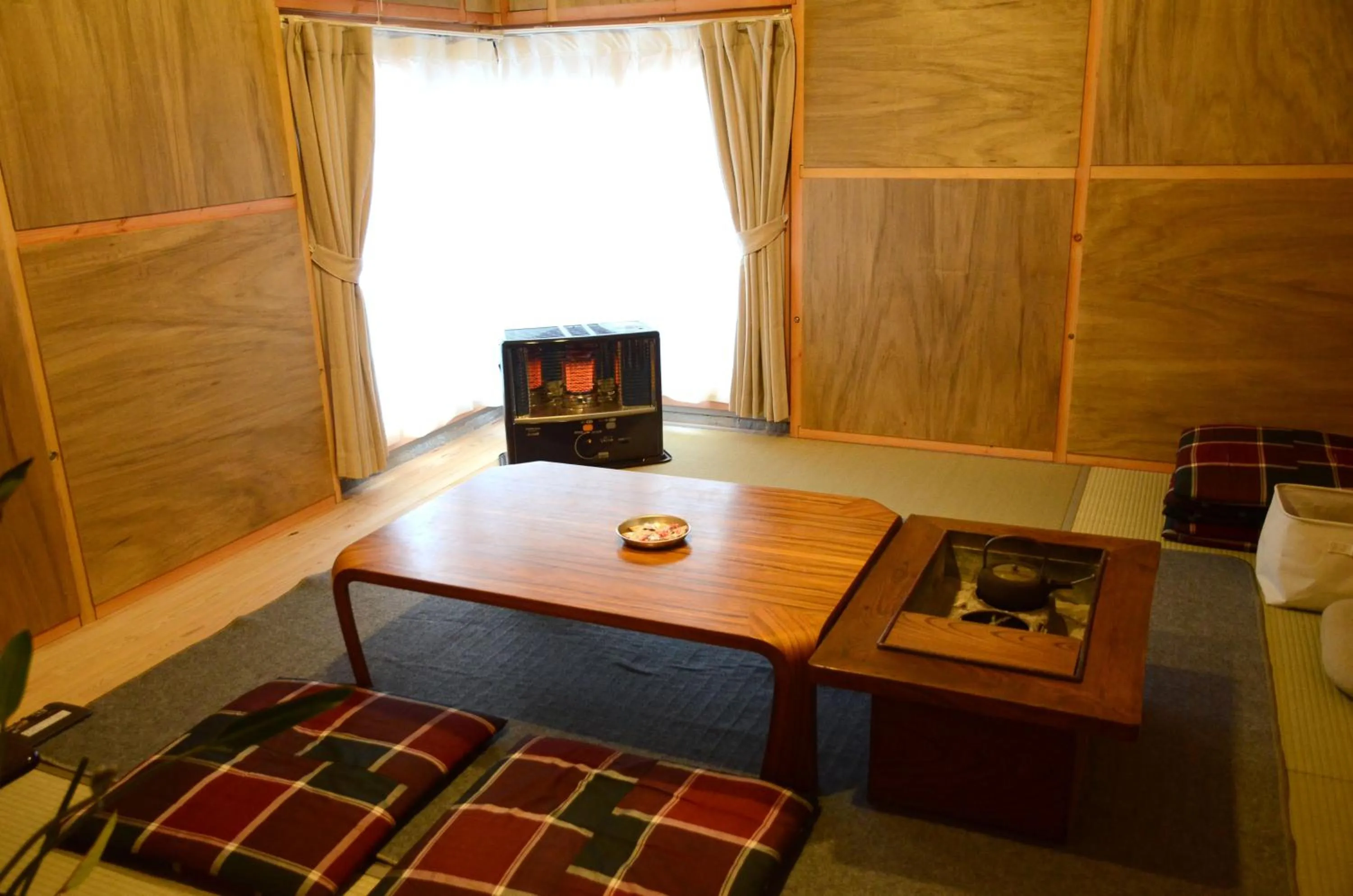 Communal lounge/ TV room, Bed in Sai no Tsuno Guest House