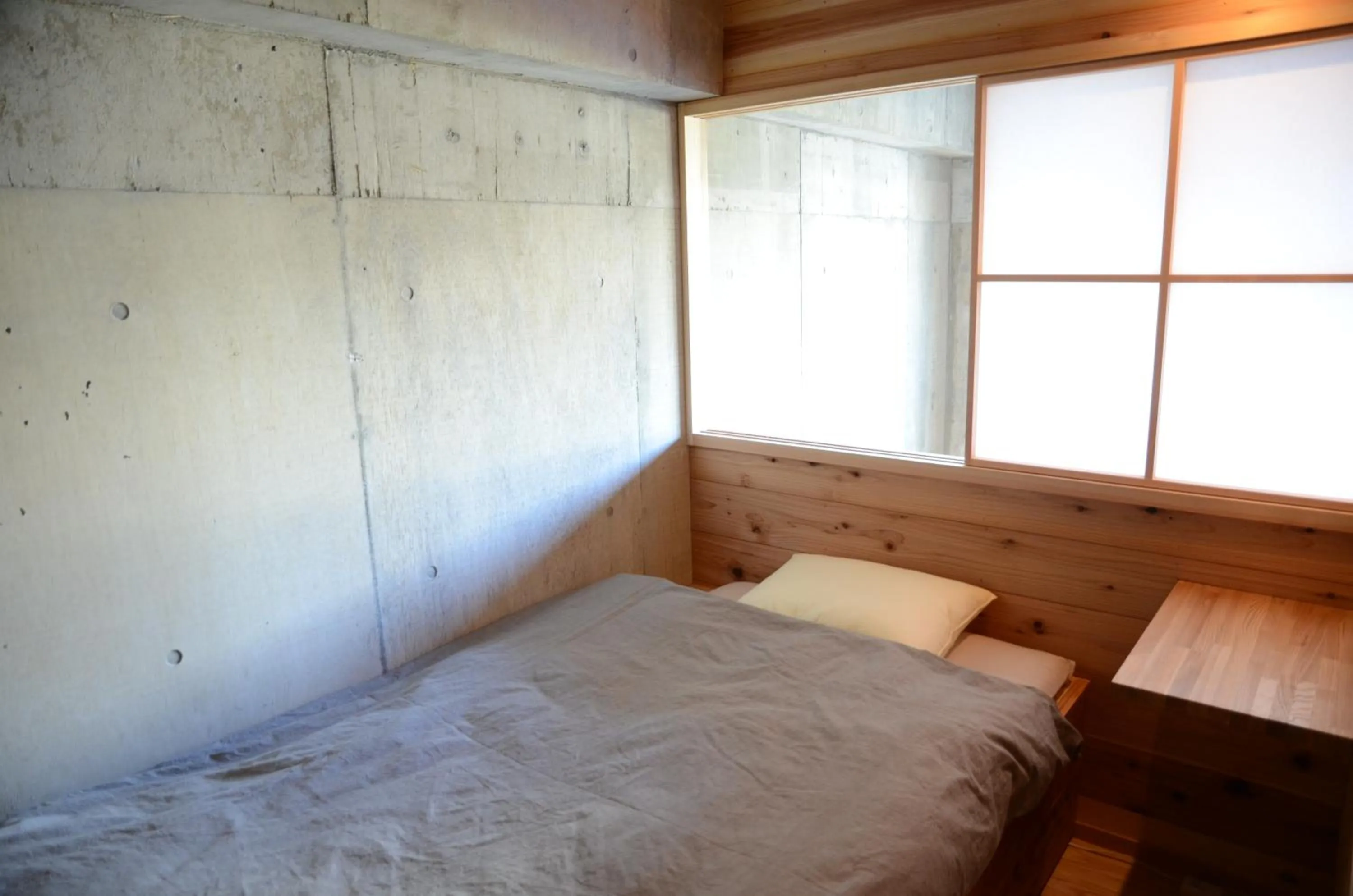 Bed in Sai no Tsuno Guest House